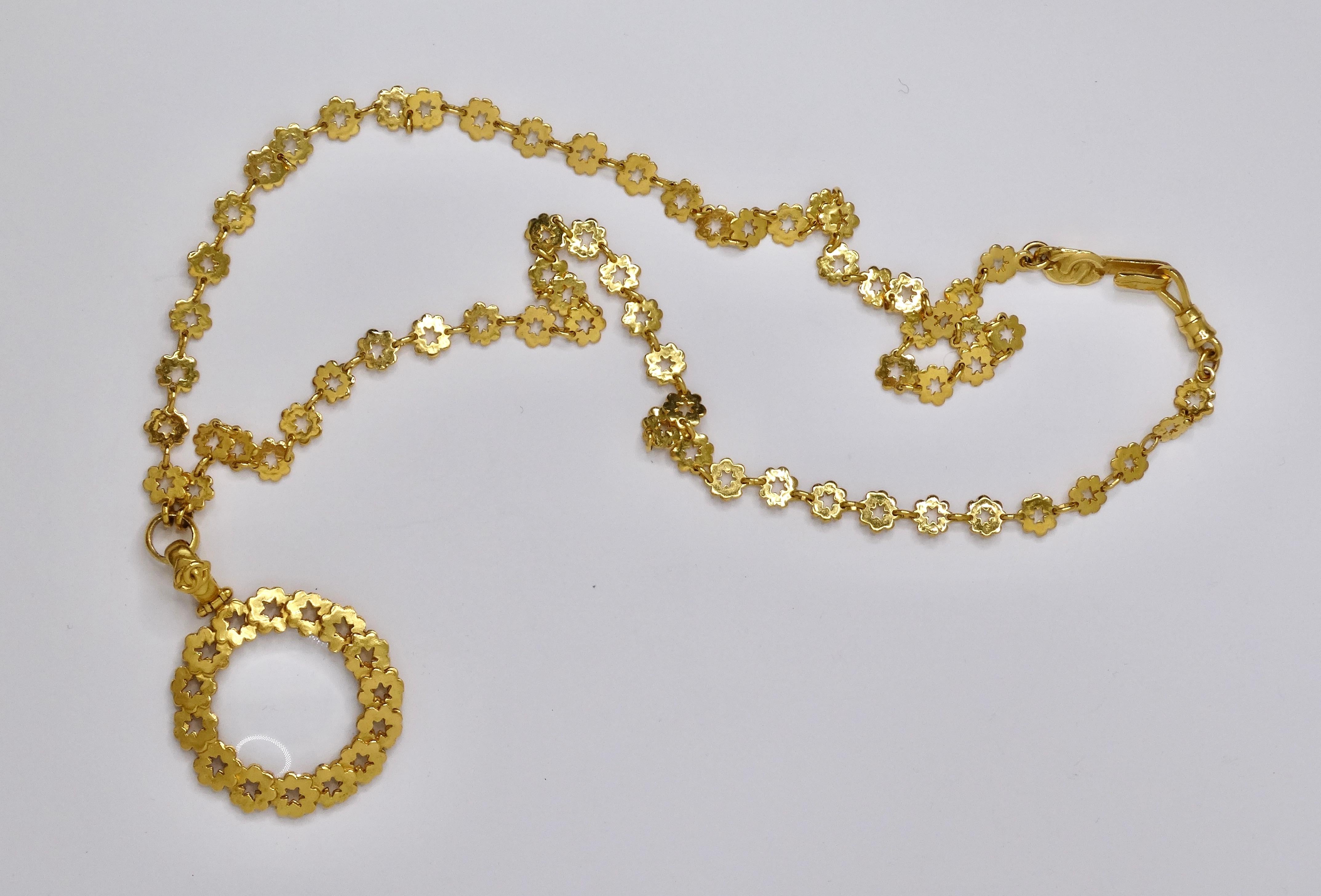 This is a unique and rare piece of Chanel. A beautiful piece to add to any Chanel collector! This features a long chain (21.5 inches) that is made up of delicate and adorable gold flowers linked together. The whole piece is featured in plated 24k