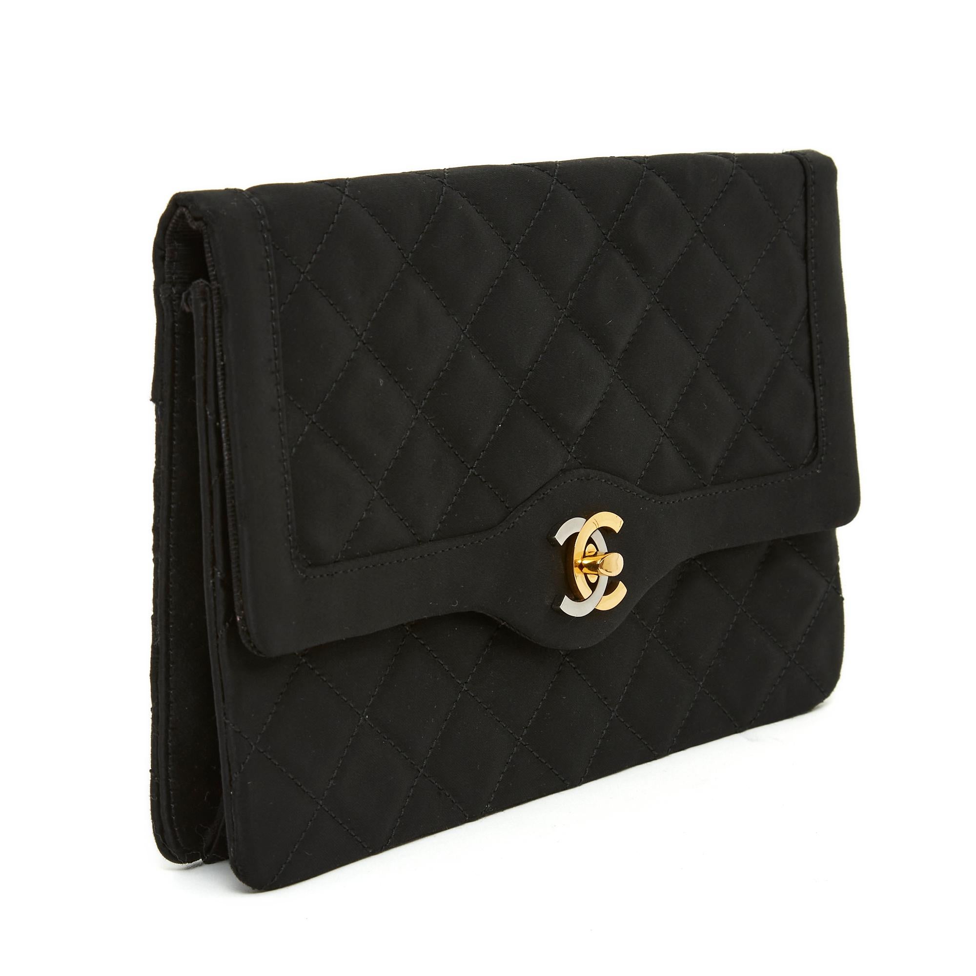 Chanel Haute Couture bag circa 1996, Timeless Classique line, Wallet on Chain style, in quilted black silk satin, CC clasp in shiny gold and matt silver metal, 