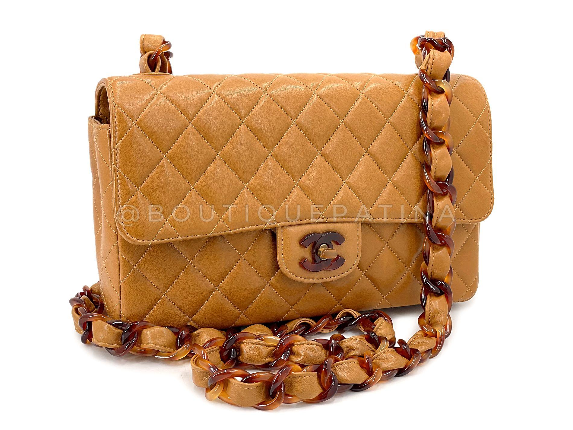 Store item: 68030
Classic Chanel vintage is this quilted caramel beige lambskin single flap with tortoise shell resin hardware. 

In the perfect classic medium size, with chunky lightweight single woven chain strap and CC turnlock with resin