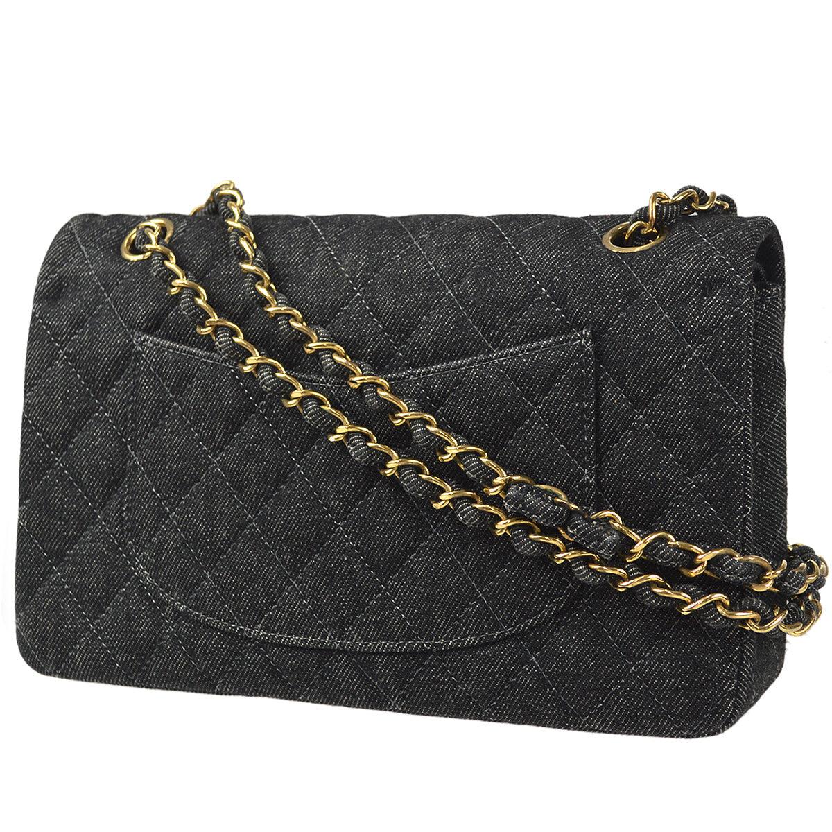 Chanel Classic Double Flap Medium Shoulder Bag Black Denim

Additional information:
Color / Material : Black / Denim
Pocket : Outside: Pocket x1, Inside: Zipper Pocket x1, Pocket x5
Comes with : Serial Sticker, Boutique Sticker
Size(Inch) : W 9.8 x