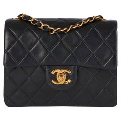 Chanel 1997 Mini sac à rabat vintage en cuir d'agneau matelassé noir 