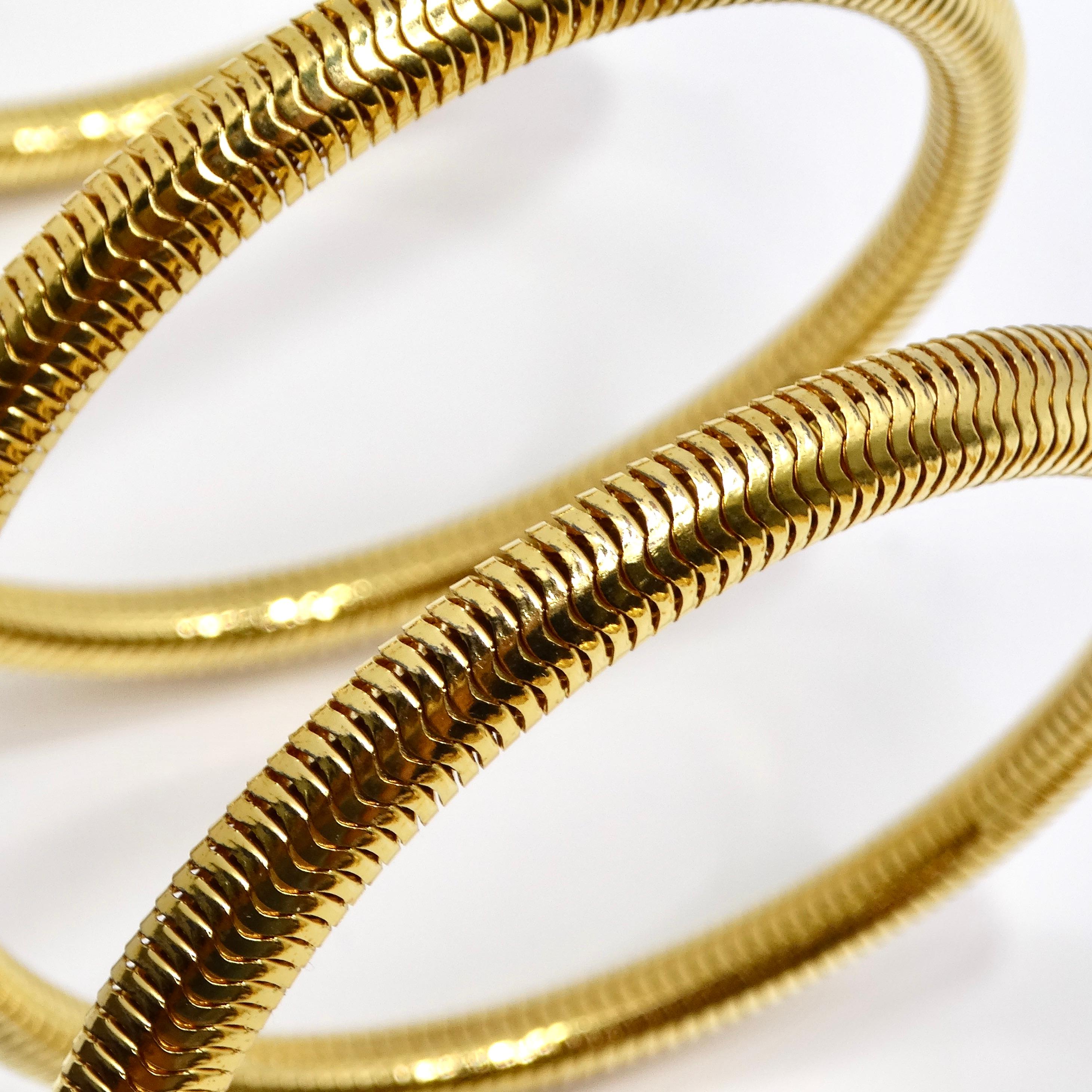 Chanel 1997 Gold Tone Spiral Arm Cuff In Excellent Condition For Sale In Scottsdale, AZ