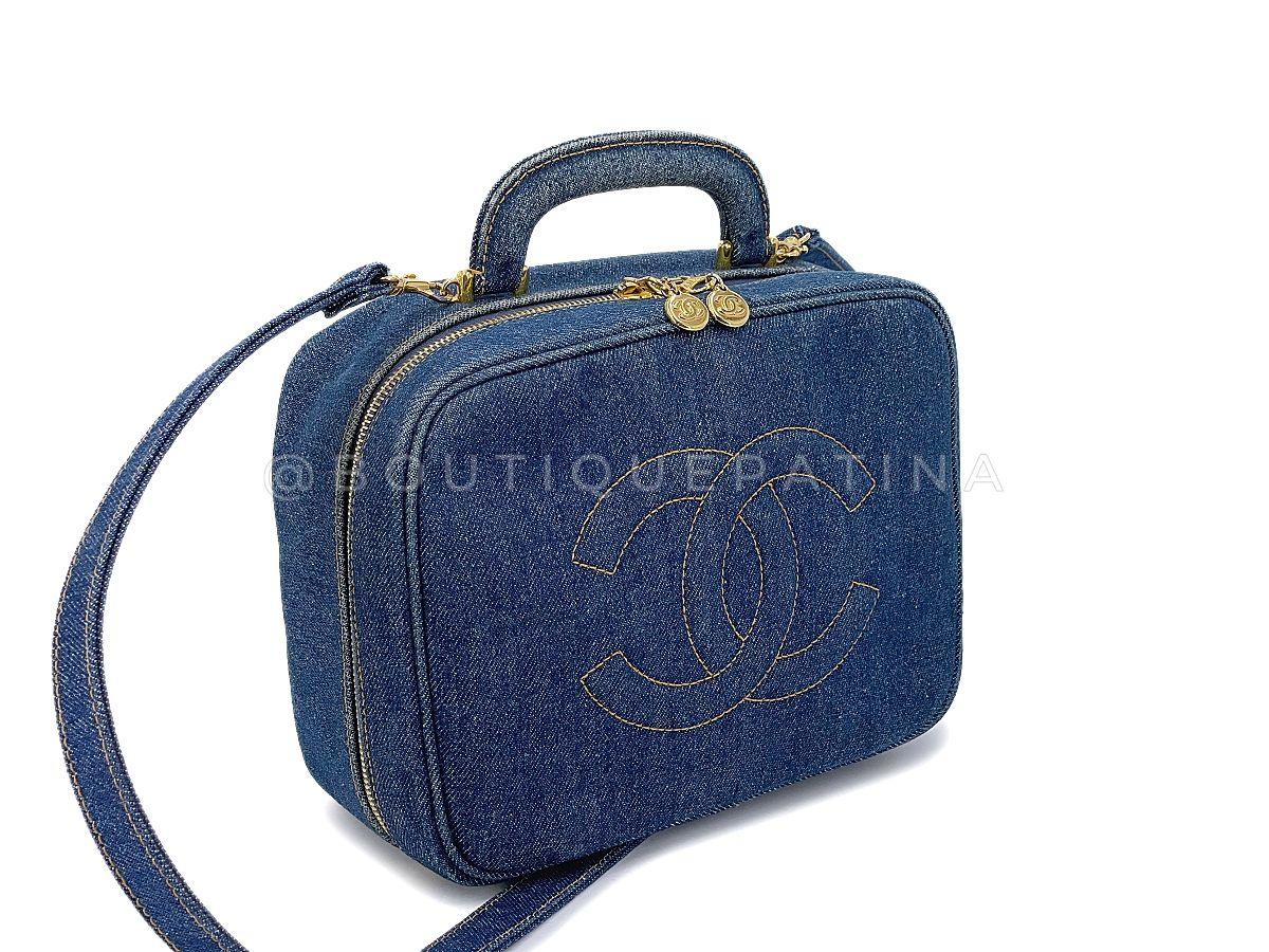 Store item: 67859
An unmistakable vintage Chanel collectible piece is this vintage vanity case box with removable chain strap.

In a special dark blue denim canvas in rare condition. 

In the 