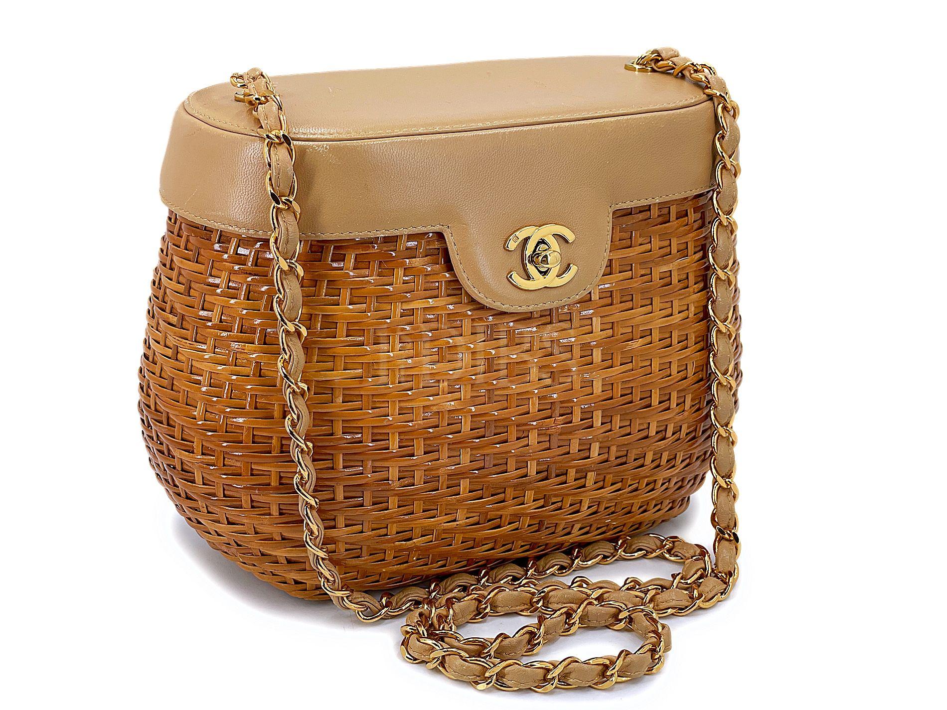 Store item: 67876
This Chanel 1997 Vintage Wicker and Beige Lambskin Basket Vanity Bag is adorable as a crossbody. A unique rounded basket shape bag with a caramel brown 