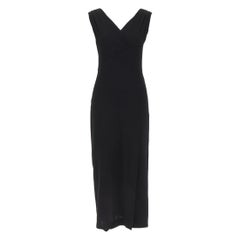 Robe de cocktail fourreau CHANEL 1998 en crêpe de laine noir, coupe asymétrique en surplis, taille FR38 M