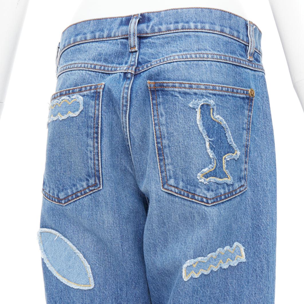 CHANEL 19A blue cotton hieroglyphics patch straight leg jeans FR40 L
Reference: KNLM/A00342
Brand: Chanel
Designer: Virginie Viard
Collection: 19A
Material: Cotton
Color: Blue
Pattern: Solid
Closure: Zip Fly
Extra Details: Discreet CC gold