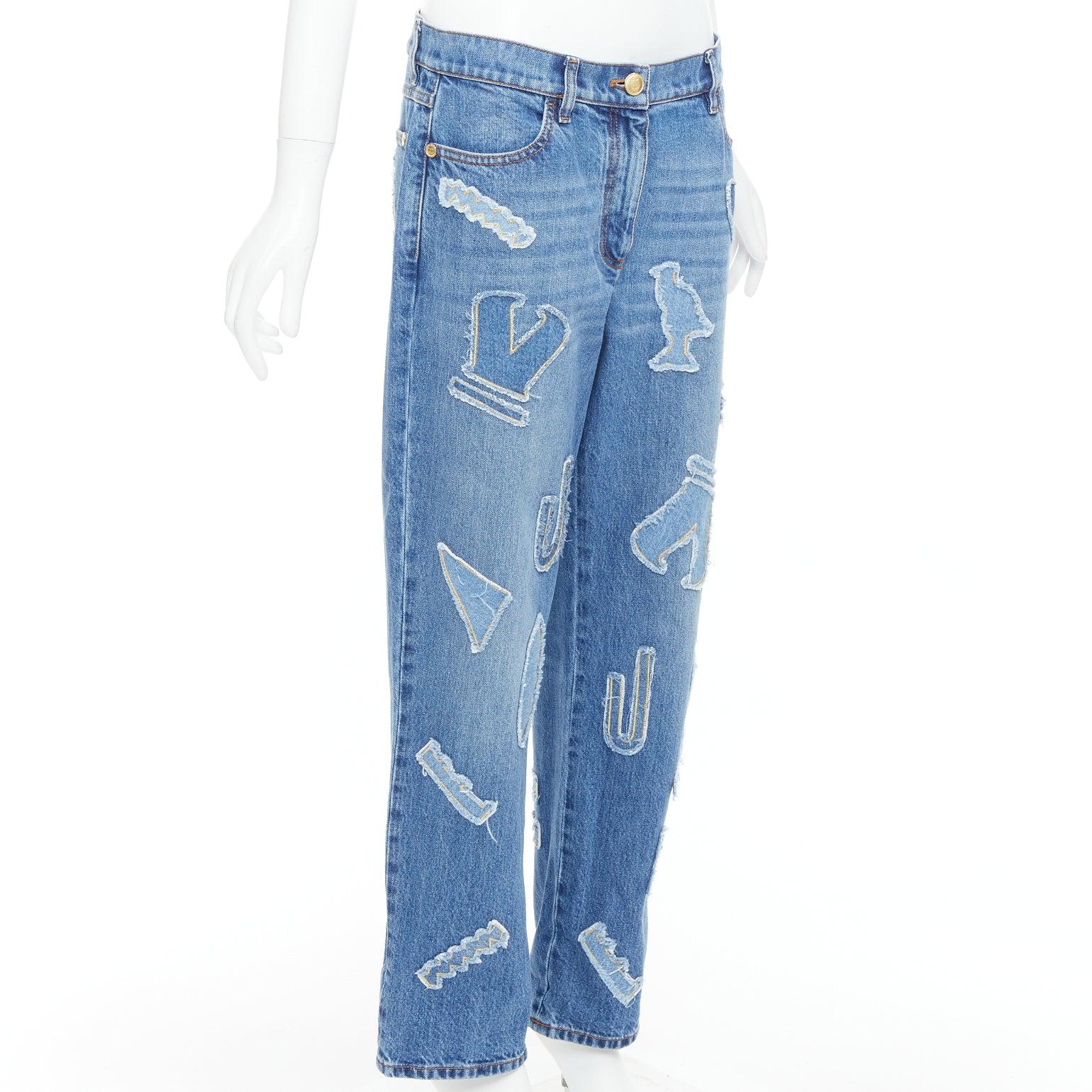 Blue CHANEL 19A blue cotton hieroglyphics patch straight leg jeans FR40 L For Sale