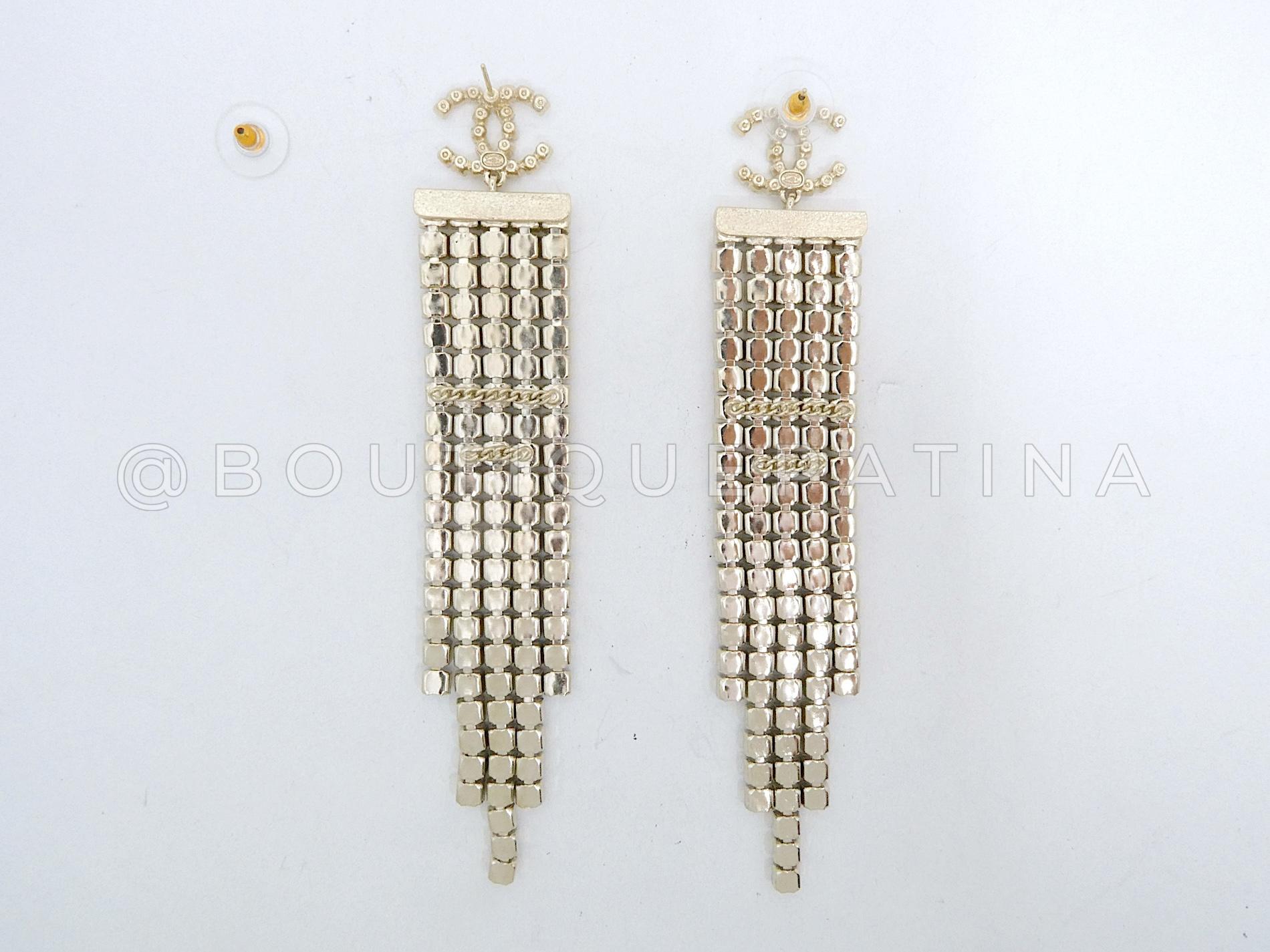 Store item: 67669
Exclusive to Lagerfeld's 19A collection - this is the larger and more limited of the two sizes produced of the earrings. There is a smaller set of three-rows of crystals, that set was more common, and the larger massive five-row