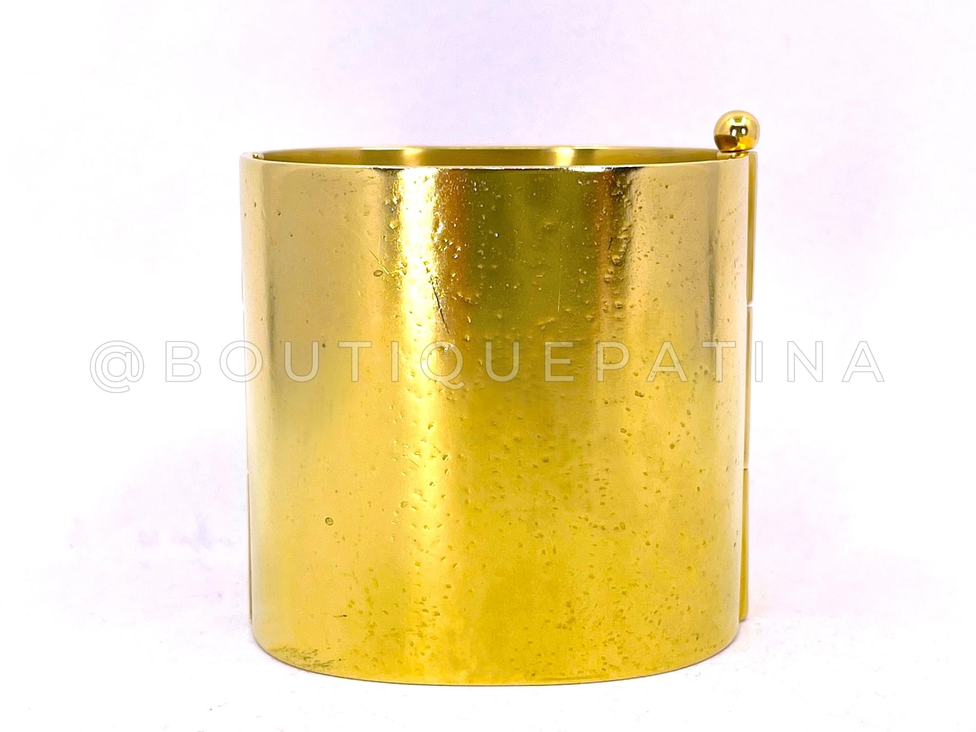 Store item: 68352
Probably the most iconic bracelet of the entire collection is this gold scarab cuff, as seen on multiple looks on Lagerfeld's 19A runway. 

Measures 6.5 inches
Stamped 19A

Dubbed 