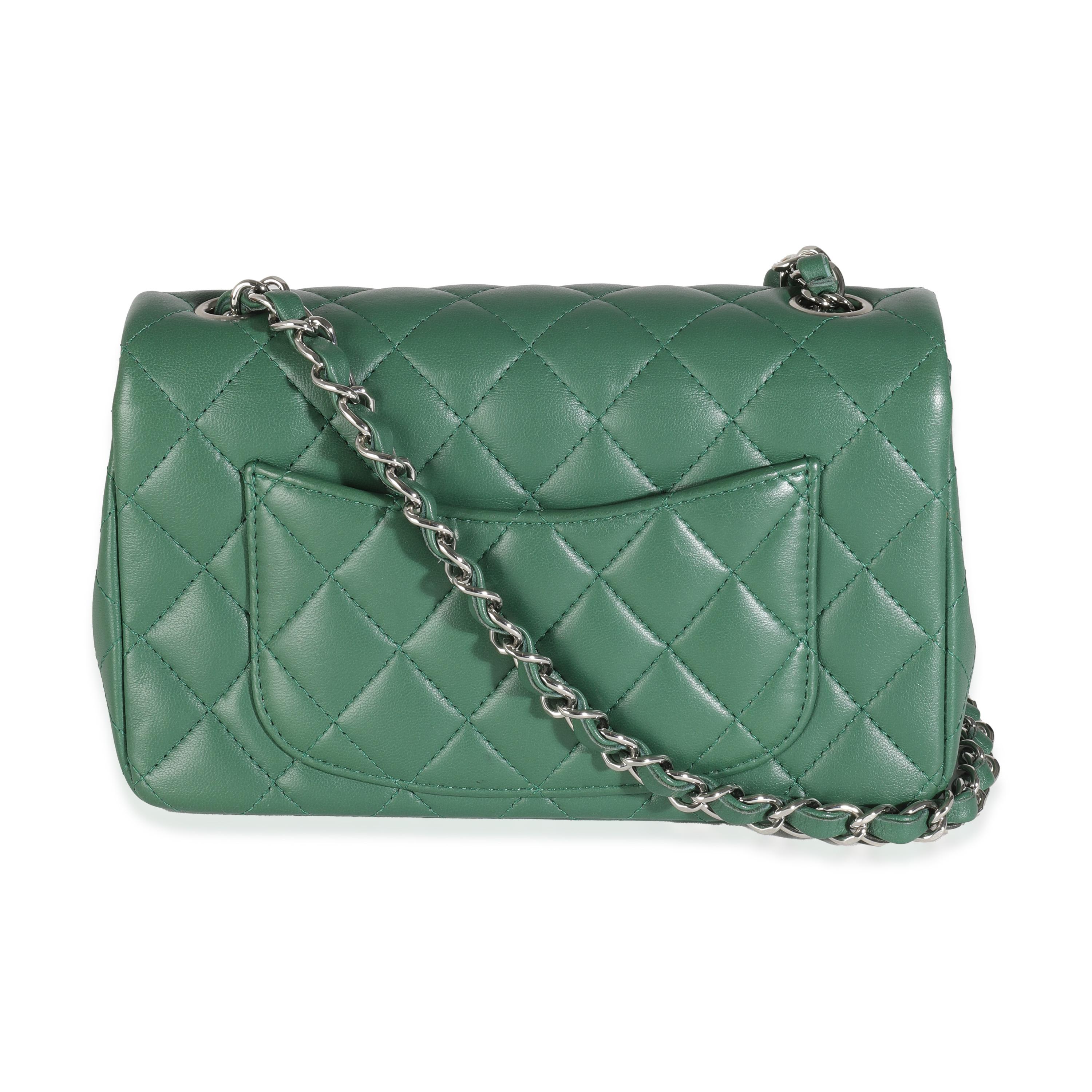 Listing Title: Chanel 19B Dark Green Quilted Lambskin Mini Rectangular Flap Bag
SKU: 144403
Condition: Pre-owned 
Condition Description: With all the hallmarks of a classic Chanel accessory, this CC quilted zip-around wallet features the house’s
