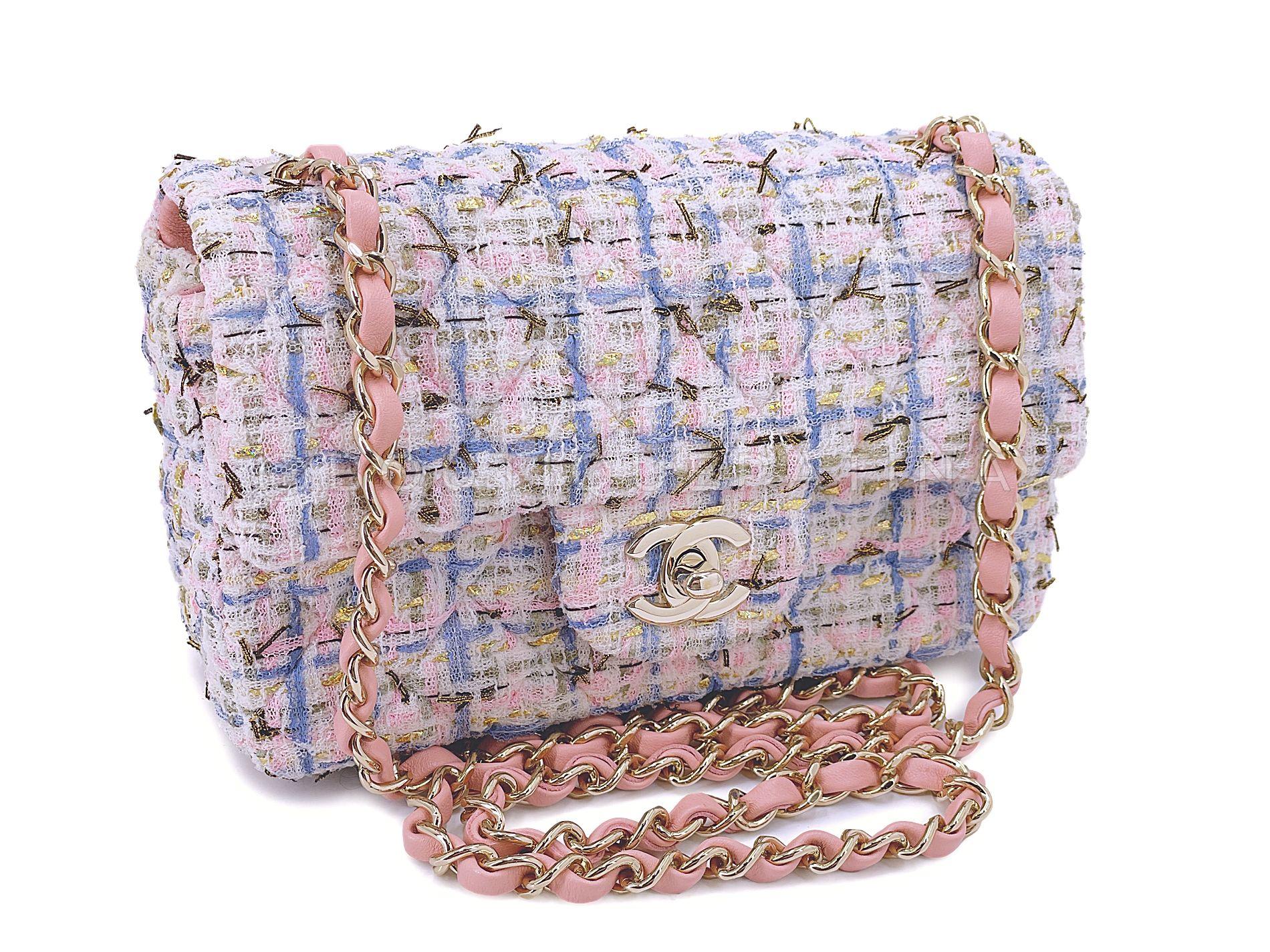 Store item: 68027
This Chanel 19C Pink Tweed Boucle Rectangular Mini Flap Bag GHW is from Karl Lagerfeld's monumental nautical-themed 2019 Resort collection. 

Intricate bright-colored boucle tweed fibers that is so very quintessential Coco Chanel,