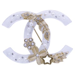 Chanel 19K Clear Acrylic Lucite CC Ornament Brooch  66079