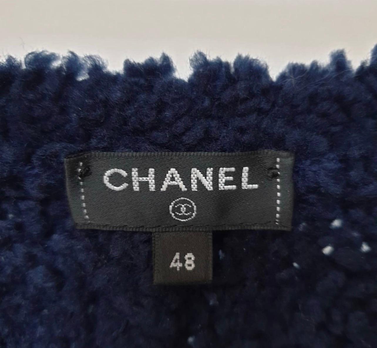 Chanel 19K Fall  Winter  CC Coco  Sweater
Navy Wool. 
Size 48 FR. Runs smaller.
Very good condition. 
Created in 1910 by talented designer Coco Chanel, the couture fashion house, with its signature intertwined double C logo, has successfully