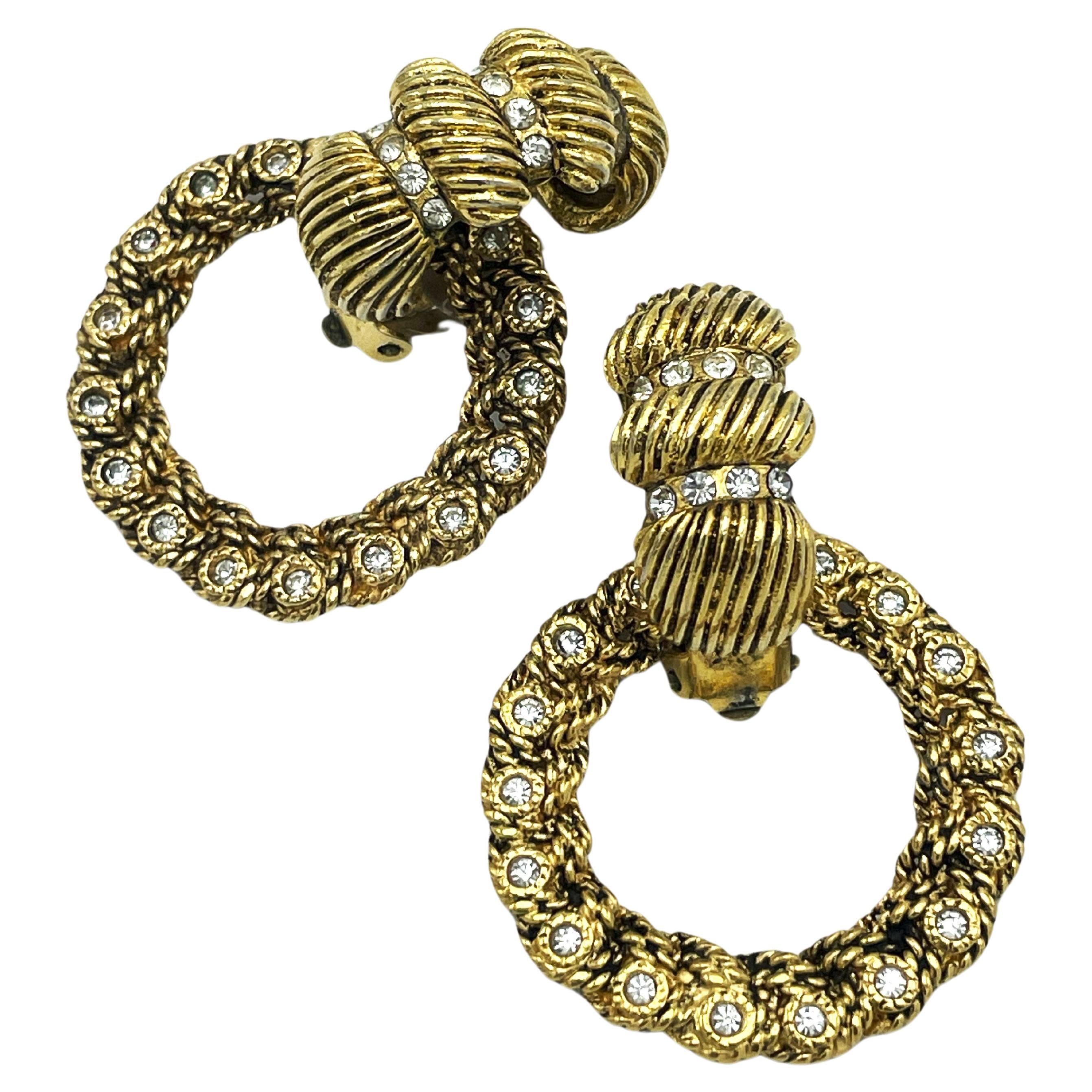 CHANEL 2 piece Clip-on earring, gold plated with rhinestones, 1970/80's, France  For Sale