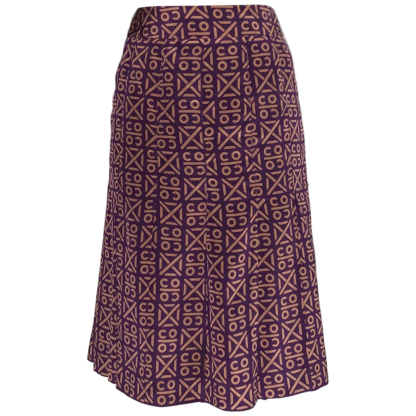 Chanel 2000 Runway Coco Logo Print Purple and Tan Silk Pleated Skirt at  1stDibs