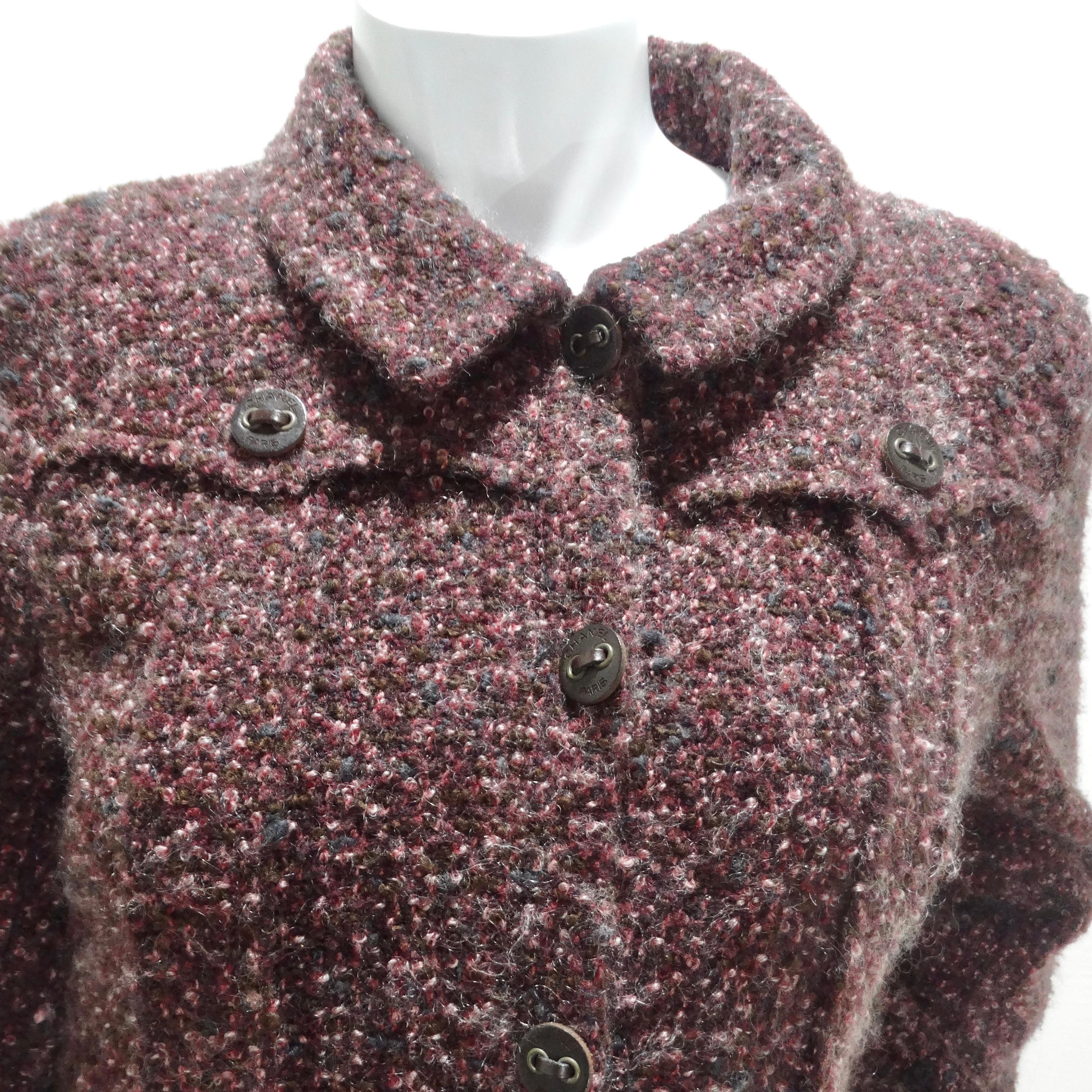 Do not miss out on a blazer dress that embodies the essence of Chanel's timeless style - the Chanel 2002 Burgundy Wool Tweed Blazer Dress. This dark burgundy/brown wool mohair tweed blazer features a classic collar, a series of brown Chanel logo