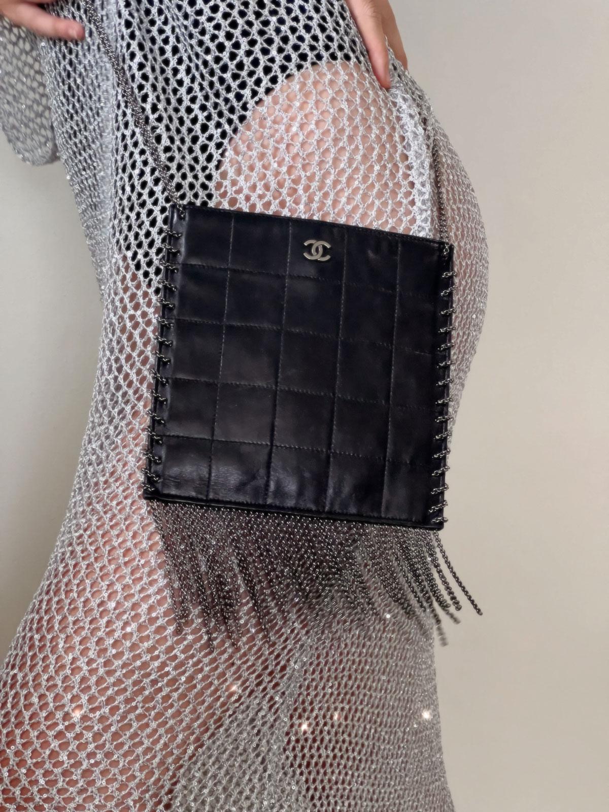 Chanel 2002 Vintage Edgy Punk Fringe Chain Quilted Mini Tote Crossbody Bag

Year: 2002-2003 {Vintage 22 Years}

Silver hardware
Square quilted lambskin
Nylon printed microfiber interior
Main interior zippered compartment
7