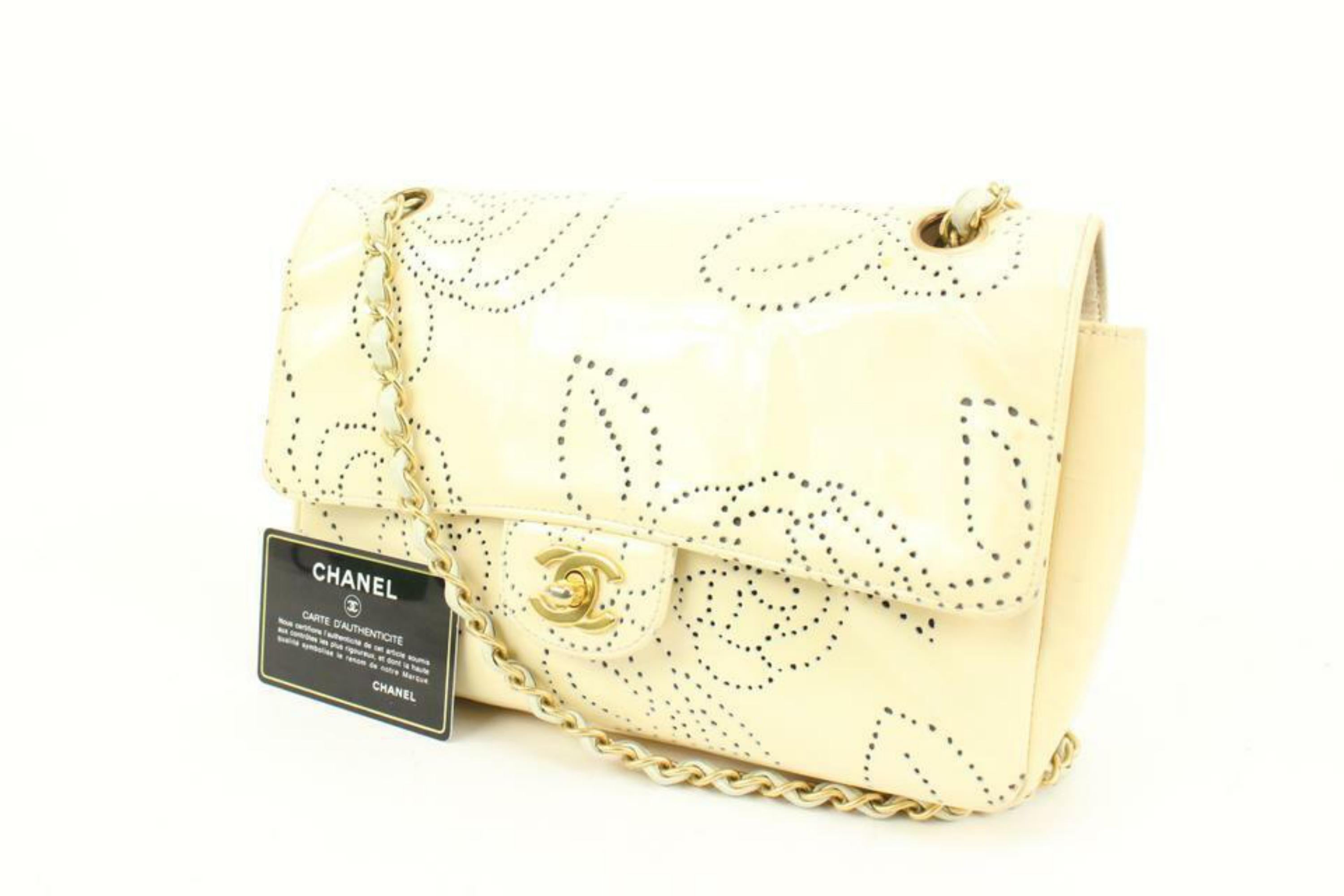 Chanel 2003 Cream Camelia Perforated Patent Medium Classic Flap GHW 2ck119
Date Code/Serial Number: 8268270
Made In: France
Measurements: Length:  9.5