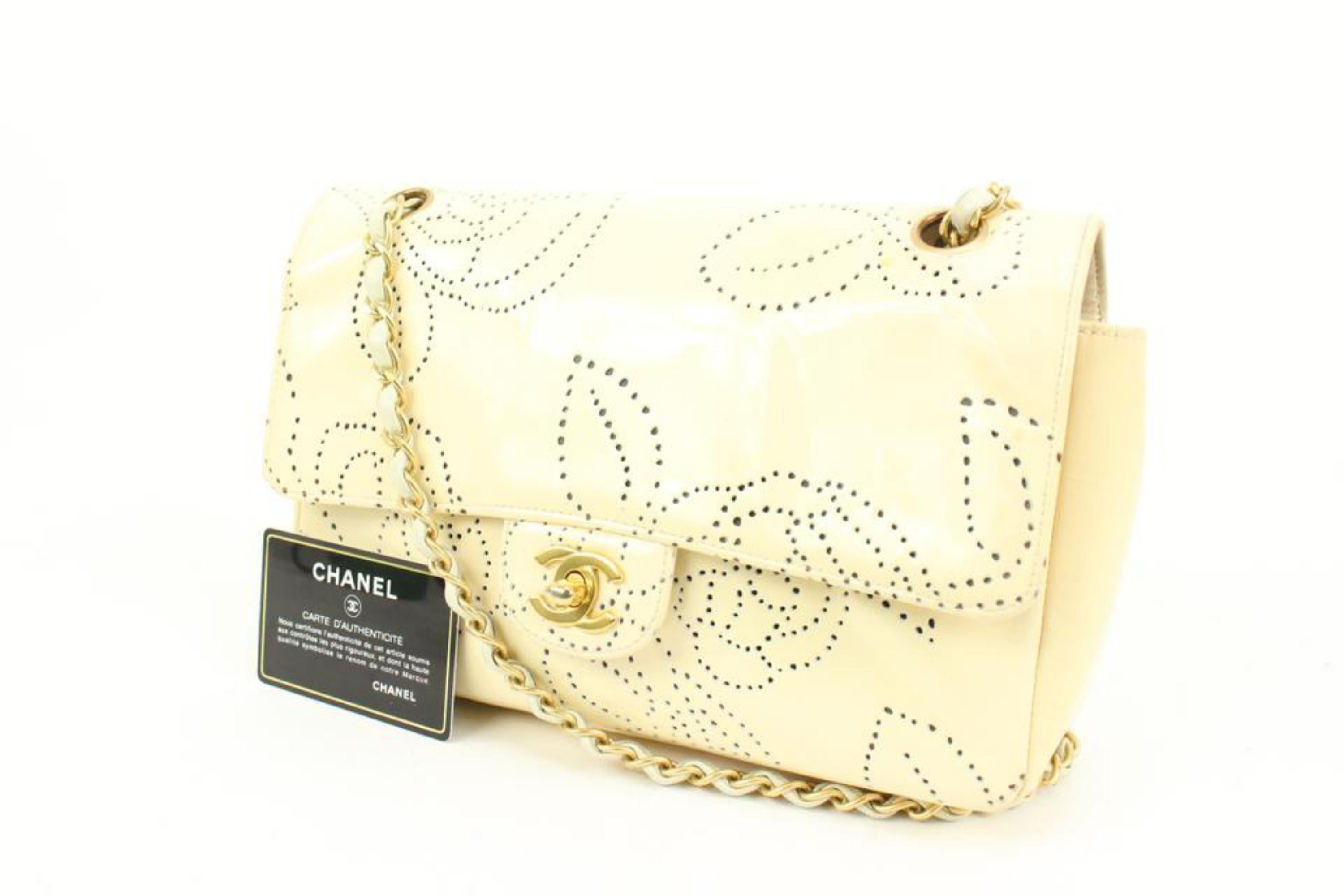 Chanel 2003 Cream Camelia Perforated Patent Medium Classic Flap GHW Fl41ck73
Date Code/Serial Number: 8268270
Made In: France
Measurements: Length:  9.5
