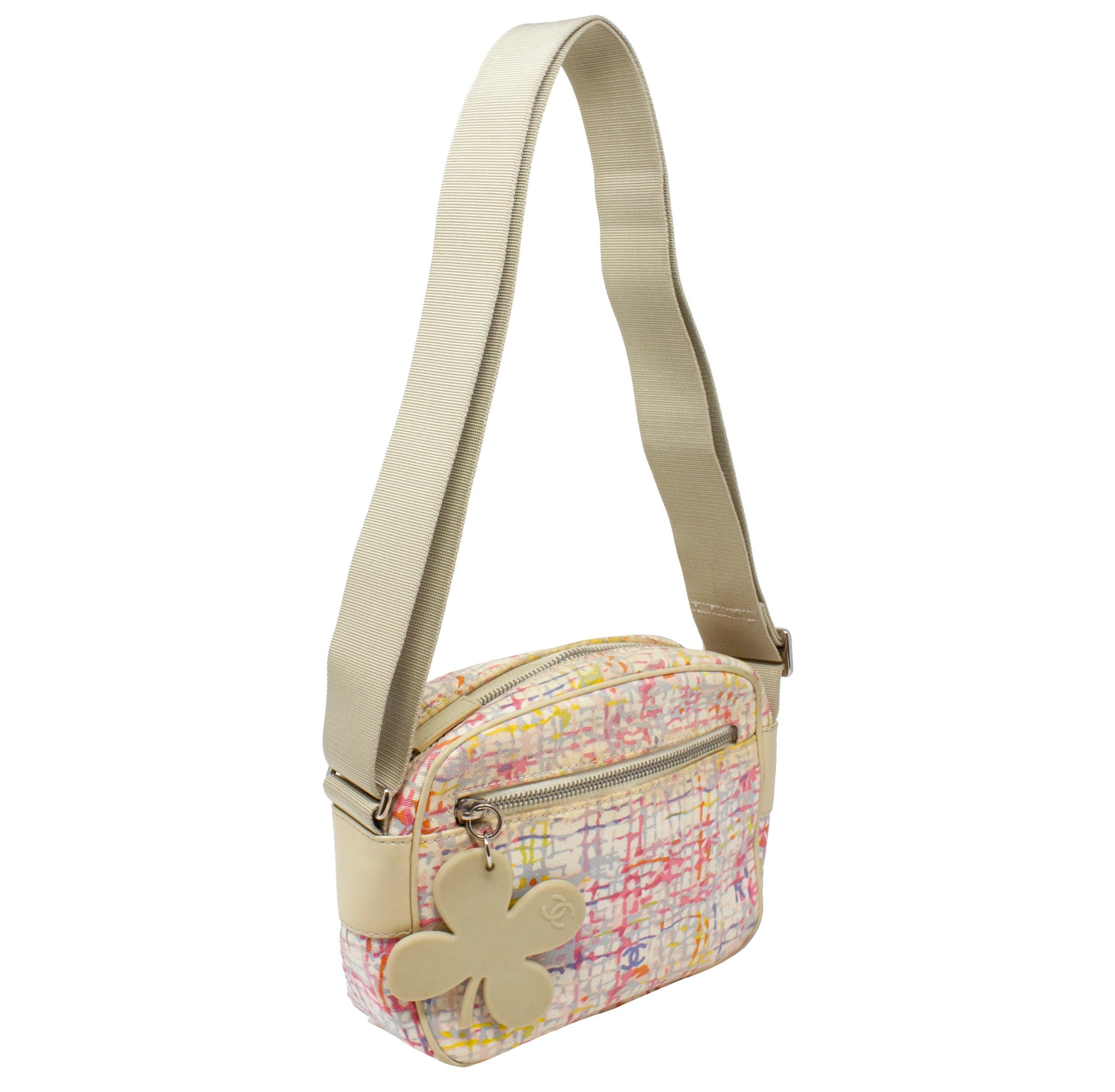 From the 2004-2005 Lucky Clover Collection! We love the adjustable shoulder strap because you can make it a shoulder bag or a crossbody. The size is amazing because it will fit your essentials but not be bulky. Cute is an understatement!!! Rendered