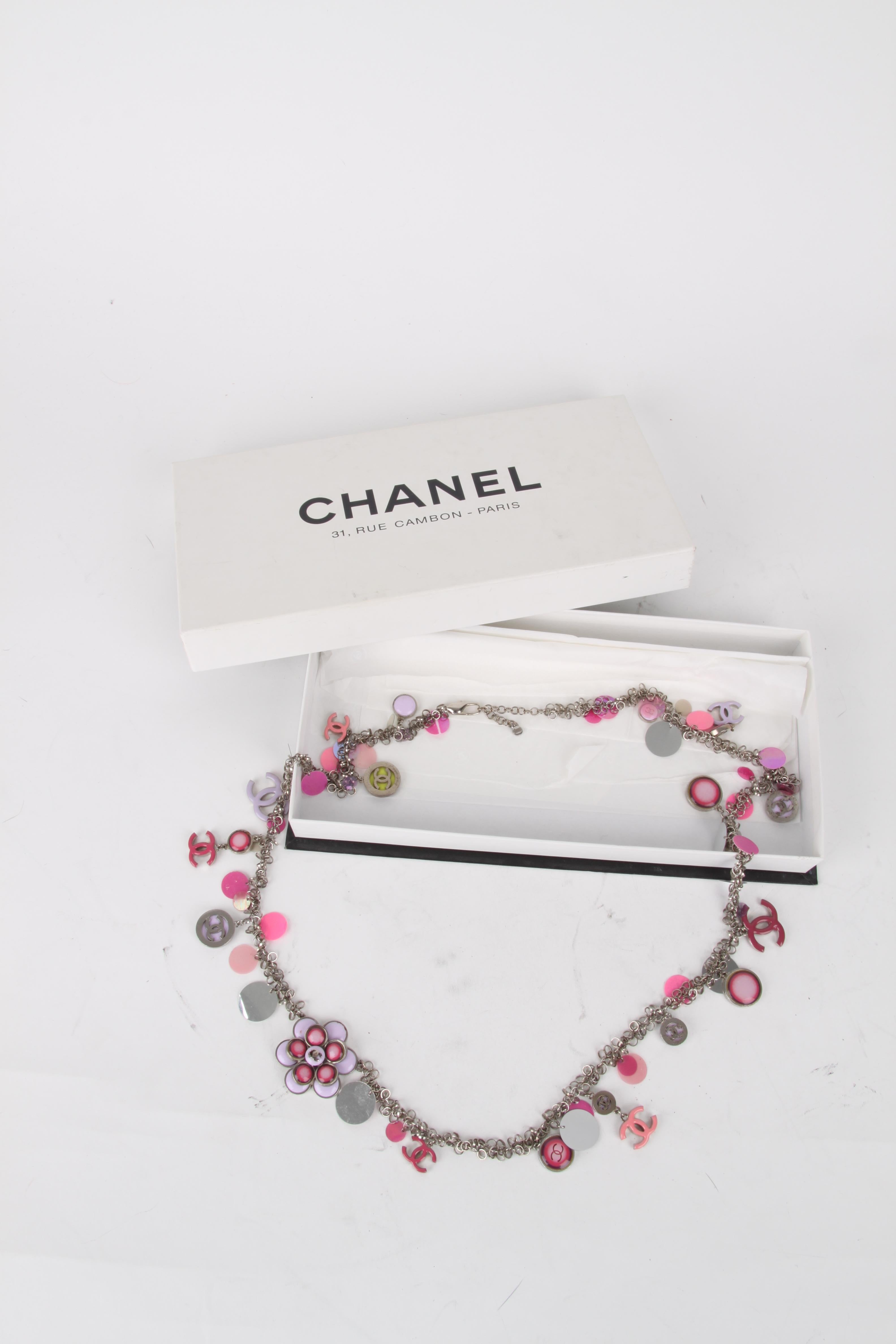 Chanel 2004 Fall/Winter (04P) Pink Silver Sequins Embellished Necklace/Belt.

This necklace features a lux CC-logo embellished exterior with pink and purple enamel finish. The necklace features a silver hook fastening velcro fastening with the