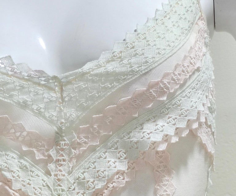 The most adorable and dainty top from the great house of Chanel. This was expertly designed with great care by Karl Lagerfeld for Chanel 2004 spring collection. The details of this top will have you falling in love over and over again. It is made of