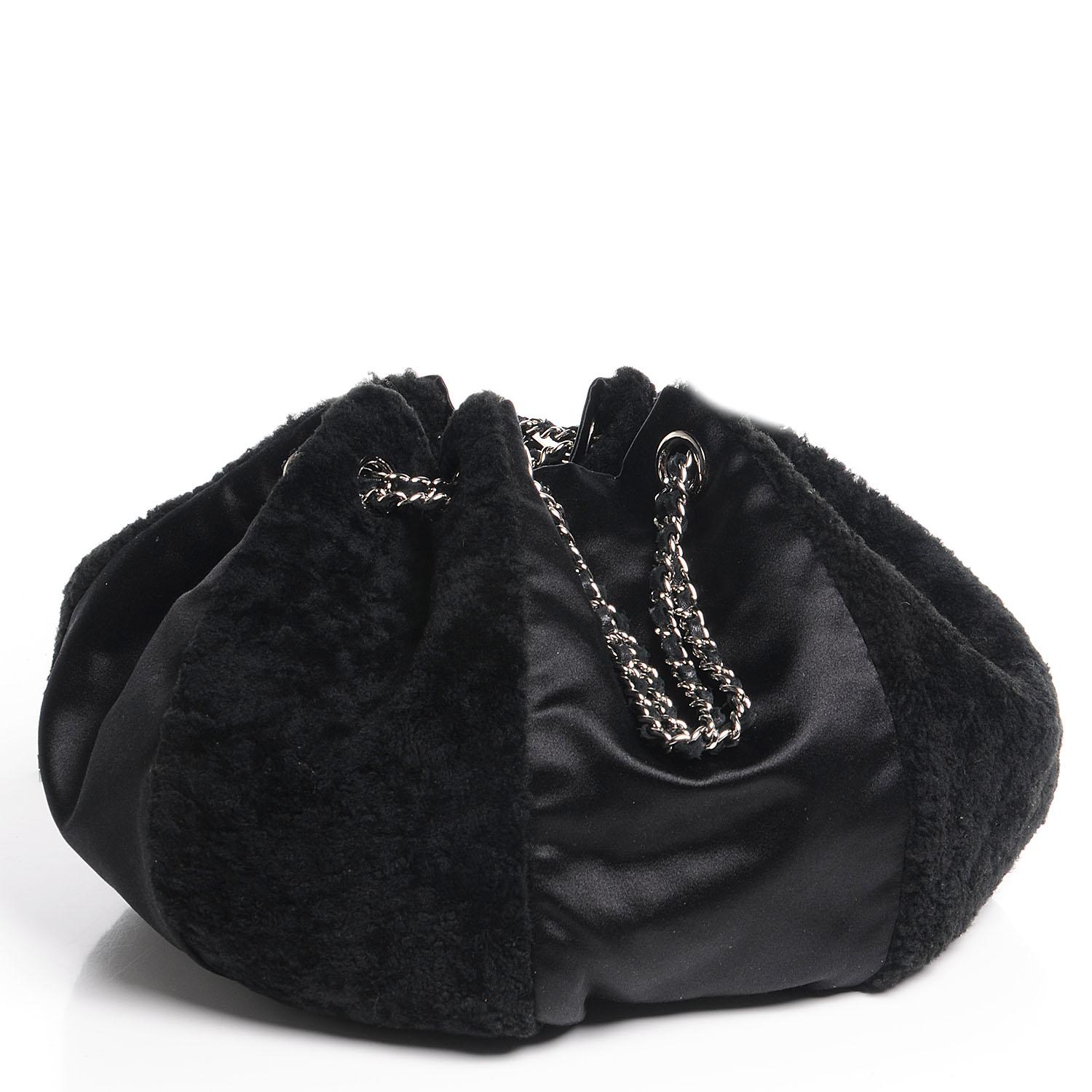 Chanel 2004 Vintage Black Shearling Satin Drawstring Tassel Bag  In Excellent Condition For Sale In Miami, FL