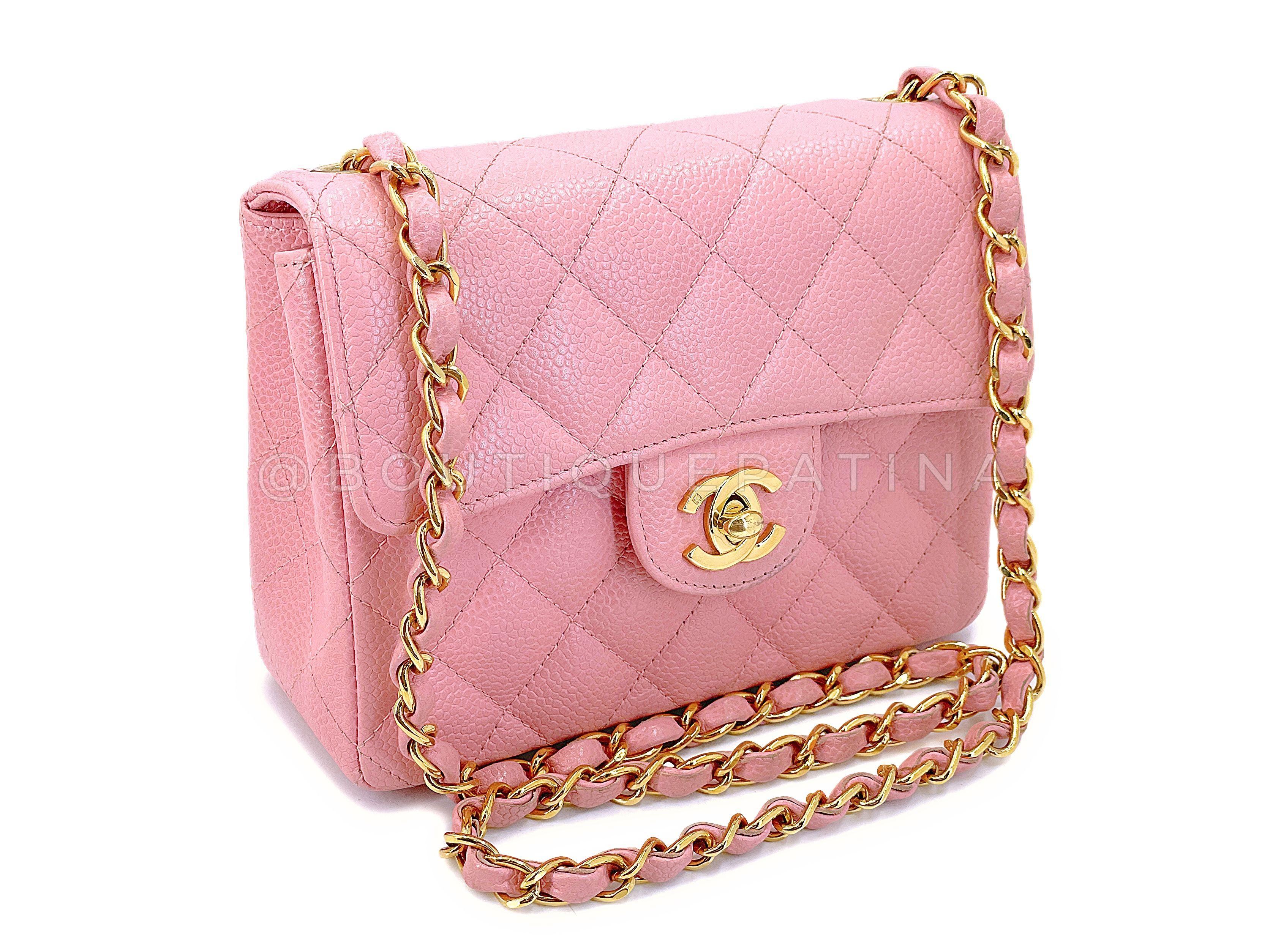 Store item: 67727
The early 2000's version of the classic square mini in caviar leather from Chanel is one of the most coveted mini flaps - with the 24k gold plated hardware. The classic CC flap is the token iconic bag for the house of Chanel. This