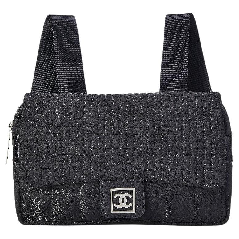 Chanel 2005 Vintage Rare Black Nylon Coco Niege Sport Duma Clasic Flap Backpack

Year: 2005-2006 {19 Years Vintage}

Silver hardware
Quilted nylon in classic flap style
Sports Line features adjustable shoulder straps
Classic flap foldover top with