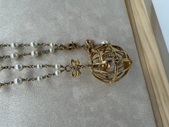 Chanel 2006 birdcage CC Bird bow ornament pearl long necklace