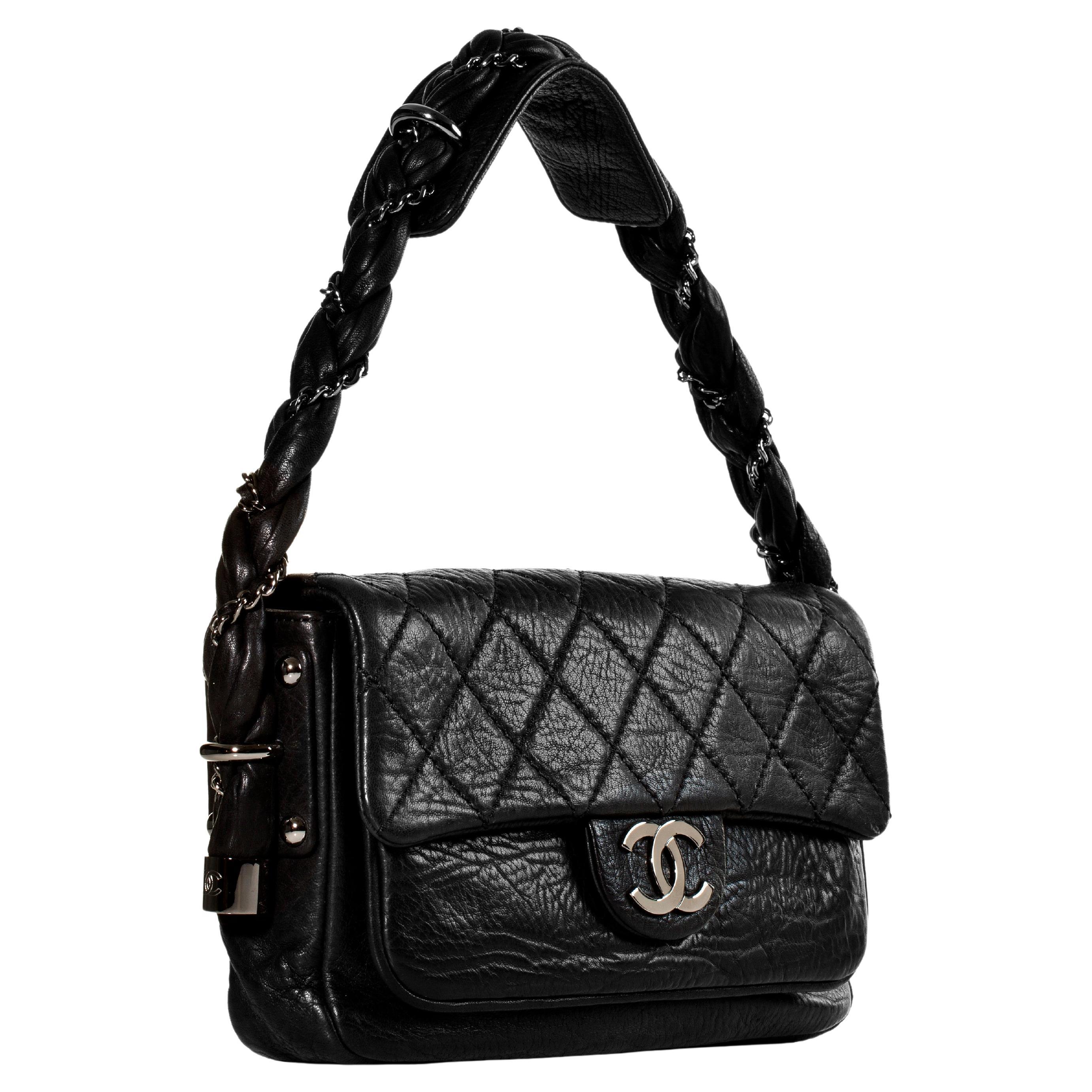 Chanel Lady Braid Quilted Distressed Quilted Lambskin Small Classic Flap Bag

2006 {VINTAGE 17 Years}

Silver hardware
Soft diamond quilted distressed lambskin leather
Top handle is braided leather with signature interwoven chain 
Silver Chanel CC