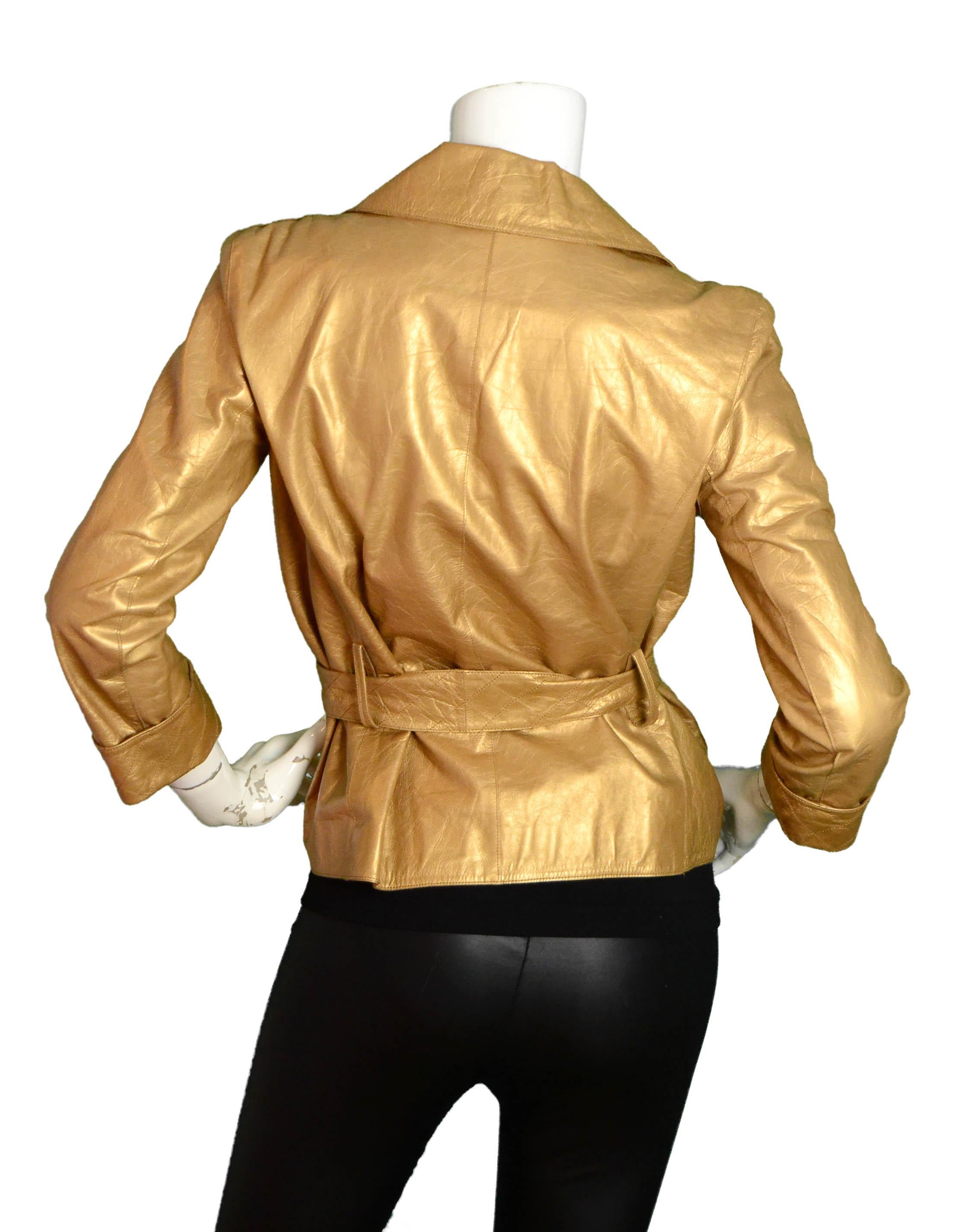 Chanel 06P Gold Leather Single Button Jacket w/Belt

Made In: France
Year of Production: 06P
Color: Gold
Materials: 100% Calfskin leather
Lining: 100% Silk
Opening/Closure: Button
Overall Condition: Very Good - two stains on collar (see