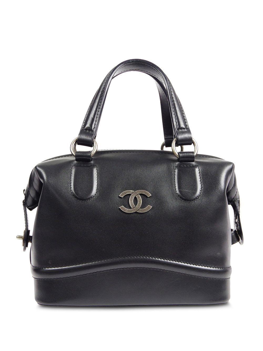 Chanel 2007 Vintage Calfskin Satchel Bowler Medium Tote Bag 

Year: 2007 {Vintage 17 Years}

Antique finish silver hardware

CC detail at front
Two handles
Zip around top closure
CC turn-lock closure 
Hidden snap for other side 
Structured