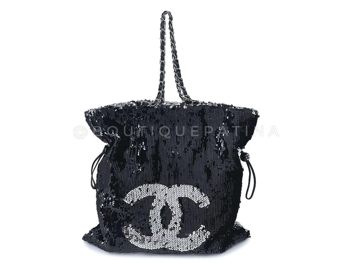Store item: 67793
A breathtaking beauty and limited distribution, this Chanel Silver XL LIMITED Summer Nights Reversible Sequins Hobo Tote Bag is embellished with sequins, featuring an oversized, sparkly 