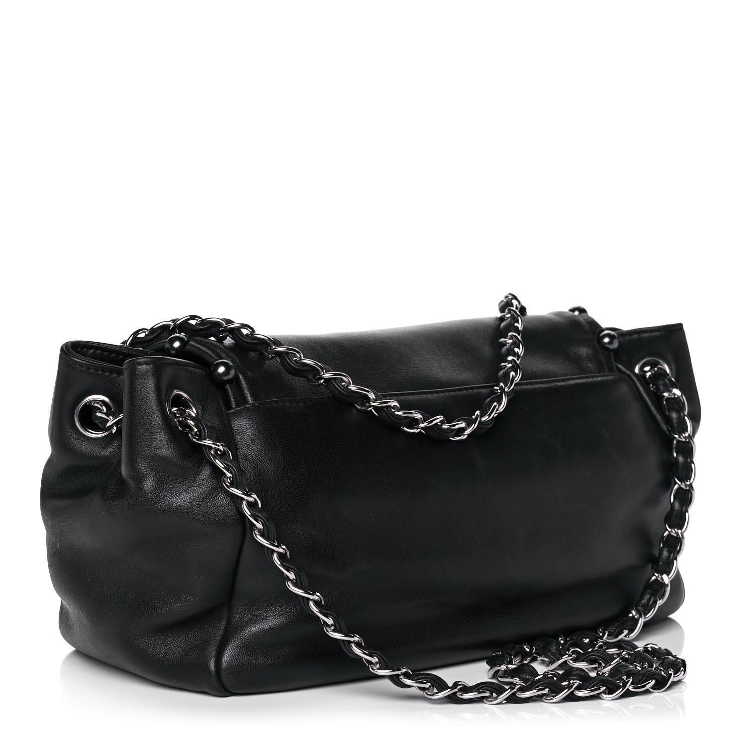 Chanel 2008 Pearl CC Flap Classic Soft Lambskin Shoulder Bag 

Silver hardware
Soft black lambskin leather 
CC Pearl embellished logo
Classic interwoven leather chain
Exterior rear slip pocket
Grey silver satin lining 
Interior zippered pocket
Snap