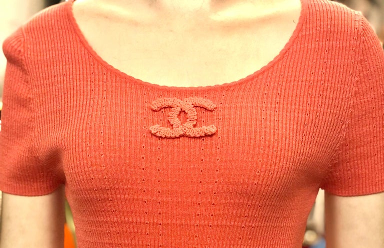 - Chanel 2009 spring pink “CC” cotton short sleeve top. 

- Size 44. 

- 63% cotton. 37% nylon. 