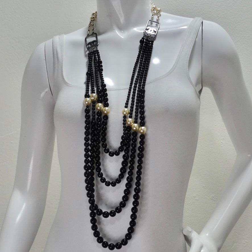 Chanel 2010 Black and Ivory Resin Pearl Multi Strand CC Logo Necklace In Good Condition For Sale In Scottsdale, AZ