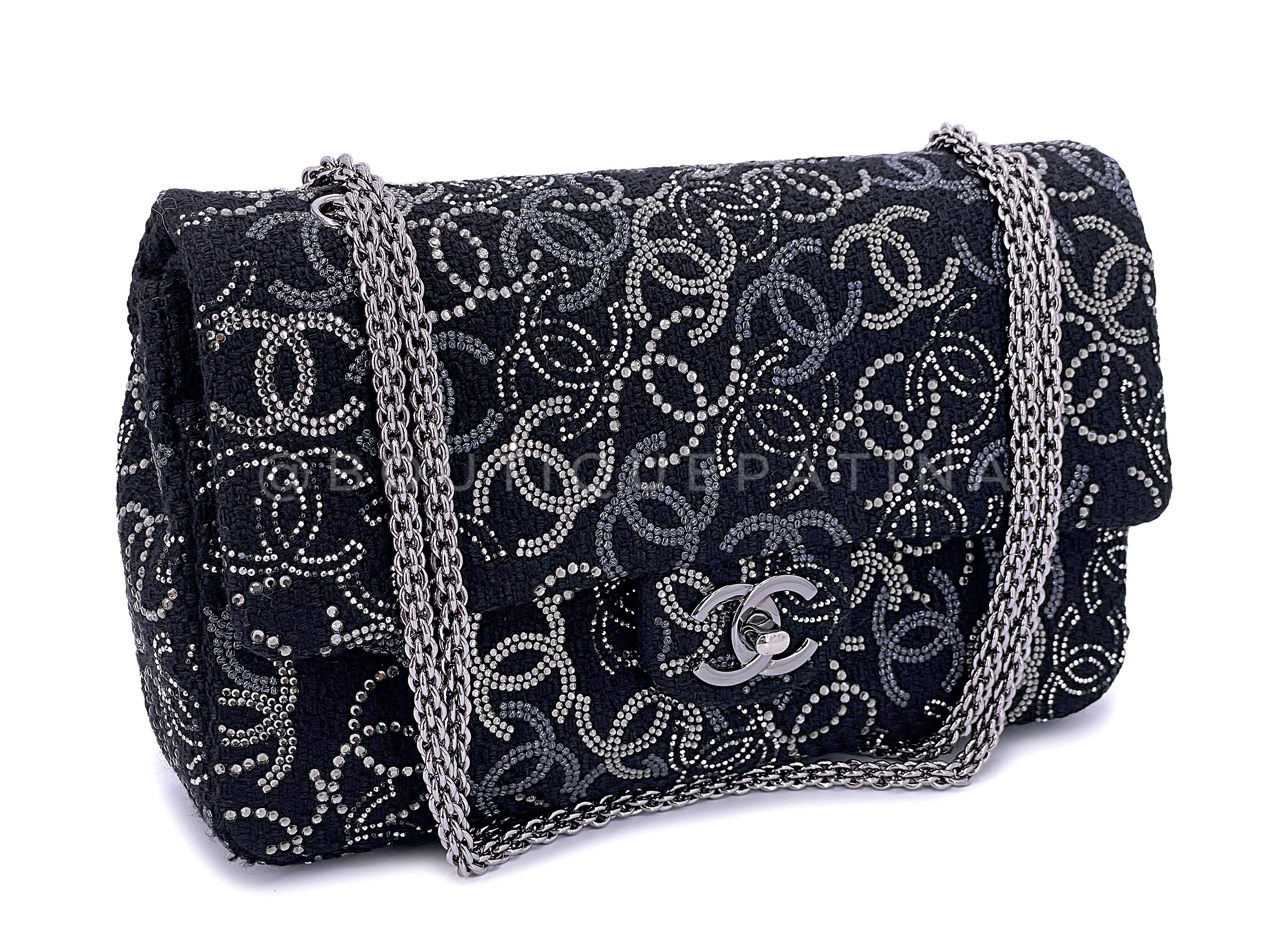 Store item: 67299
Intricately finely-spun black tweed yarn, etched metal studs and strass crystals make this beautiful Chanel 2010 Black Paris-Shanghai Pudong Medium Classic Double Flap Bag.

As seen in the 2010 Paris-Shanghai collection, this bag