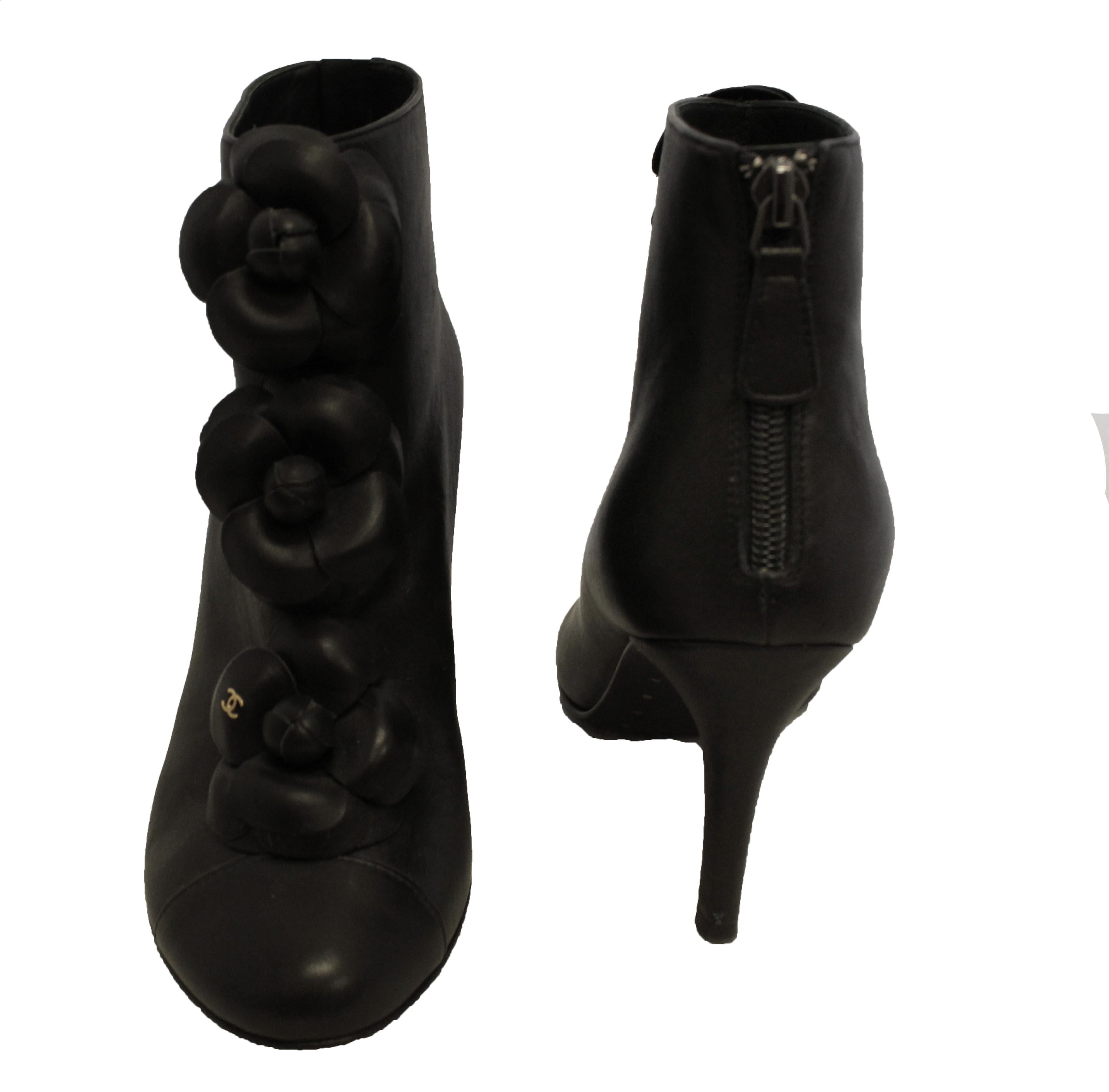 Chanel 2010 Fall Black Leather Camellia Flower Embellished Ankle Boots In Excellent Condition In Palm Beach, FL