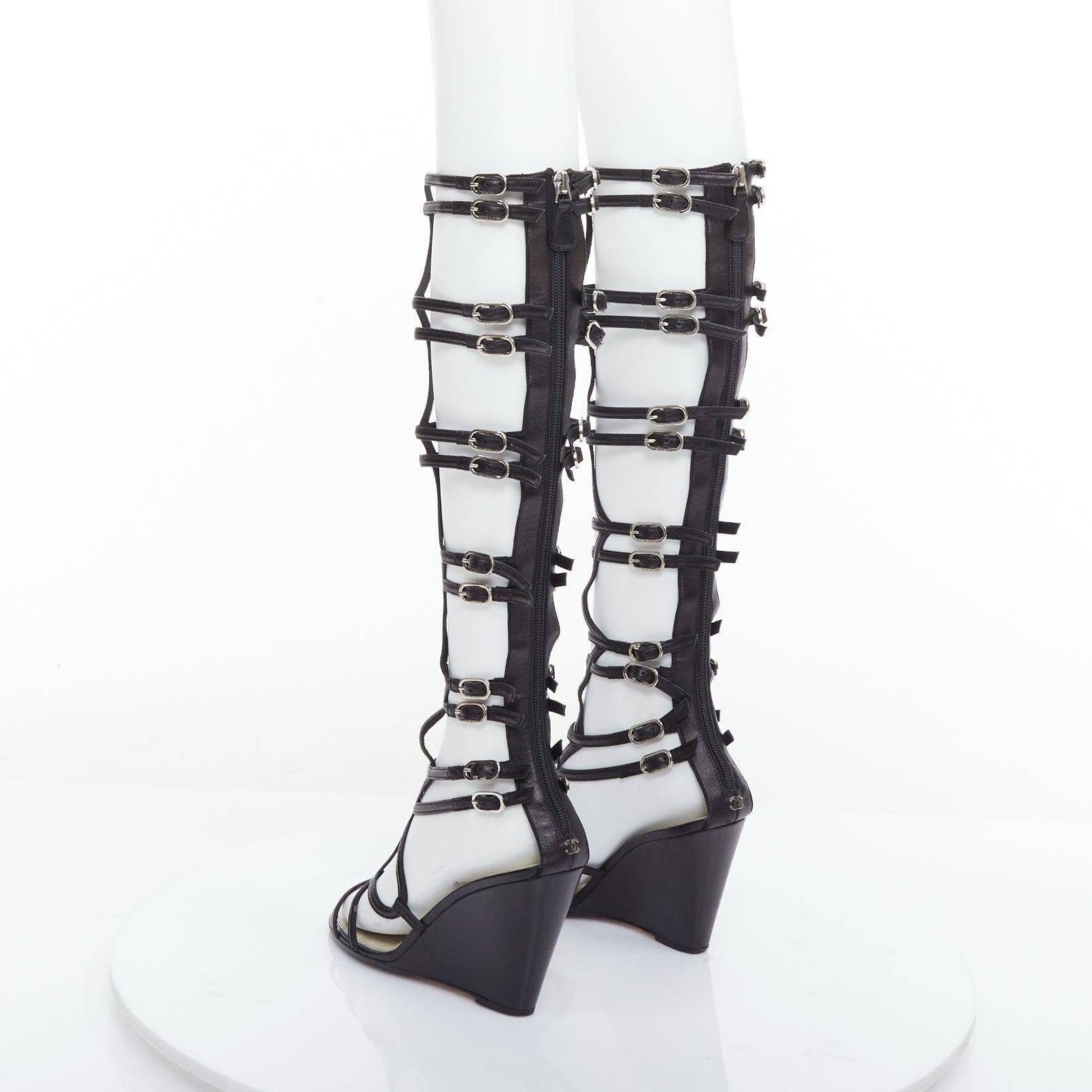 Women's CHANEL 2010 Runway black leather gladiator wedge sandals EU38