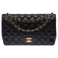Borsa a tracolla Chanel 2010 Timeless, media, nera, in pelle Caviar, con doppia patta