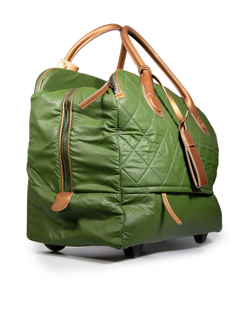 CONDITION is Very good. Minimal wear to bag is evident. Minimal wear to the handles handle tab, top, left leather tab, base, bottom corners and the protective feet with abrasions. Tarnishing on the logo hardware, and zips on this used Chanel