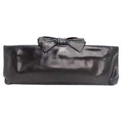 Chanel 2011: pochette con fiocco in pelle di agnello nera