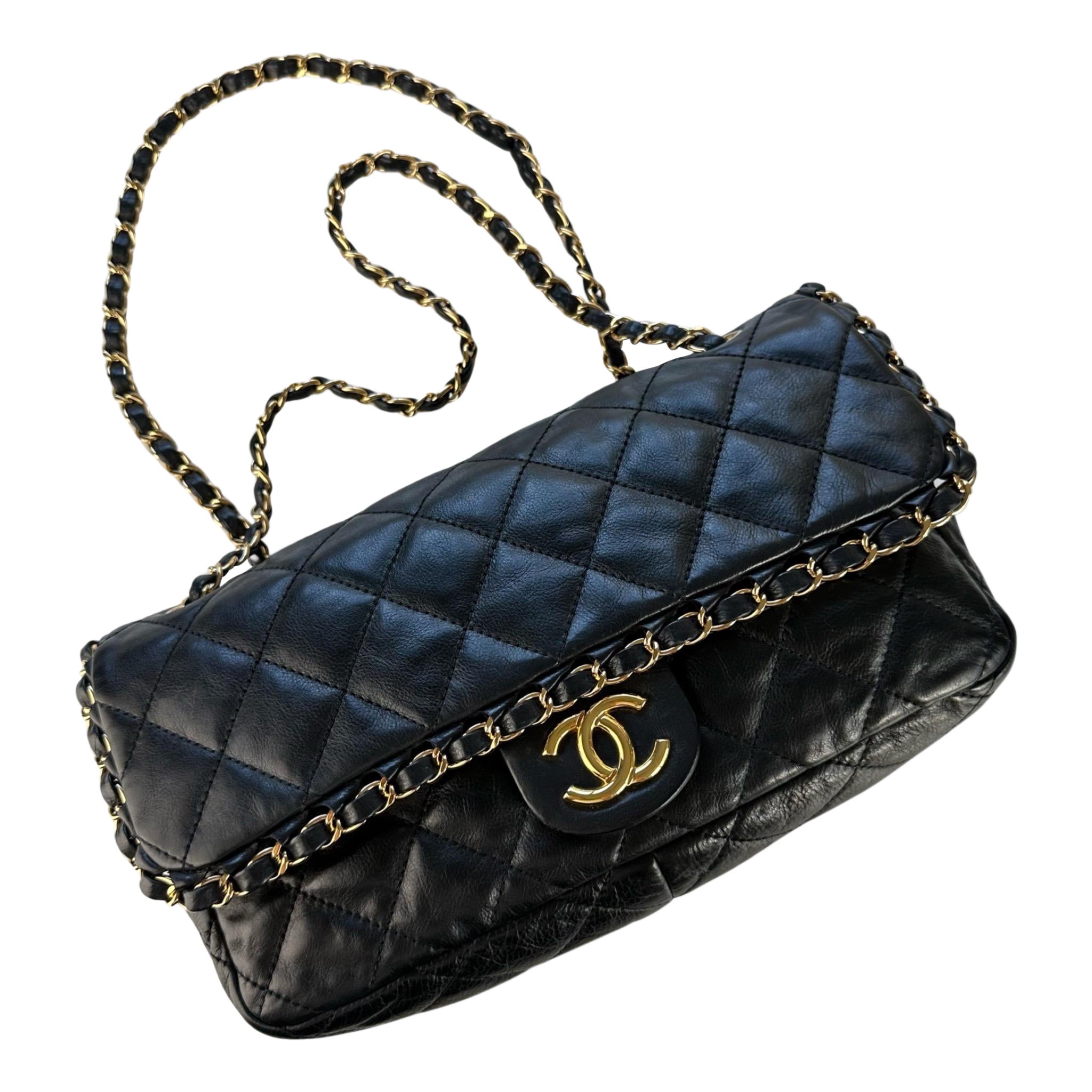 Chanel Calfskin Chain Me Jumbo Flap Bag in Black 

Year: 2011  {Vintage 14 Years}

This single flap shoulder bag is made of calfskin leather - super thick and soft calfskin that is stitched in a diamond quilted weave. 4 Gold grommets have allow The