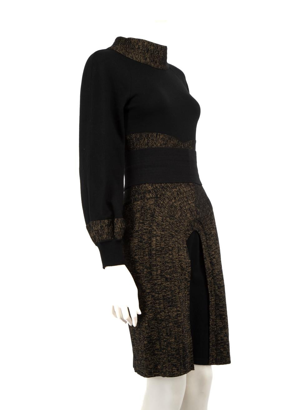 CONDITION is Very good. Minimal wear to the dress is evident. One pluck to the weave on the lower right side. Tarnishing to the zipper pull on the separate waistband. Light pilling to the wool on this used Chanel designer resale item.
 
 Details
 
