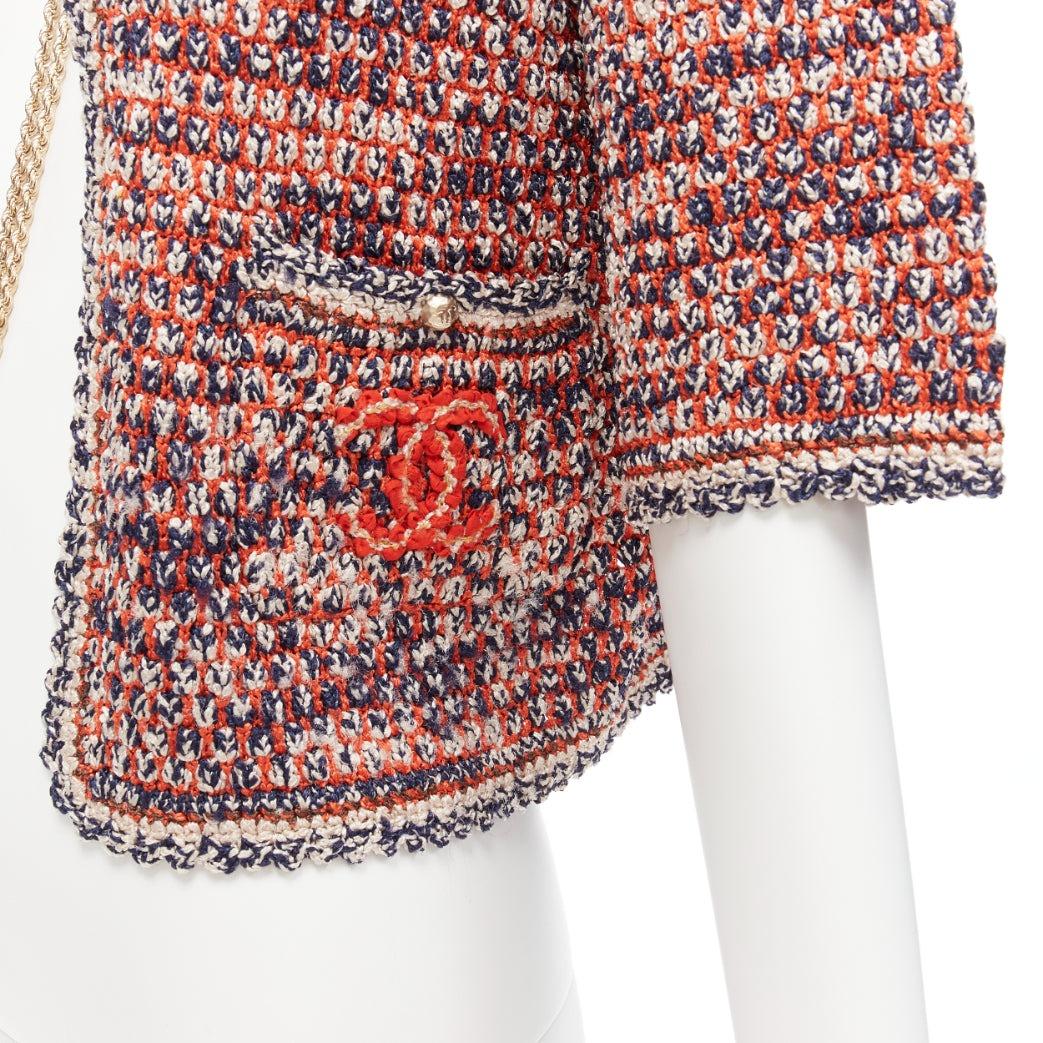 CHANEL 2011 red boule knit CC logo gold chain cropped jacket FR36 S
Reference: TGAS/D00755
Brand: Chanel
Designer: Karl Lagerfeld
Collection: Cruise 2011
Material: Tweed
Color: Red, Navy
Pattern: Tweed
Closure: Tie Neck
Extra Details: Hook and eye