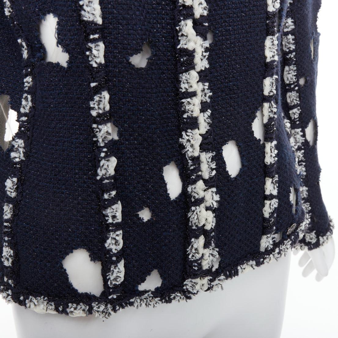 CHANEL 2011 Runway Punk distressed holey navy tweed jacket FR46 XXL
Reference: BMPA/A00260
Brand: Chanel
Designer: Karl Lagerfeld
Model: P41085W04886
Collection: Spring Summer 2011 - Runway
As seen on: The Metropolitan Costume Museum
Material:
