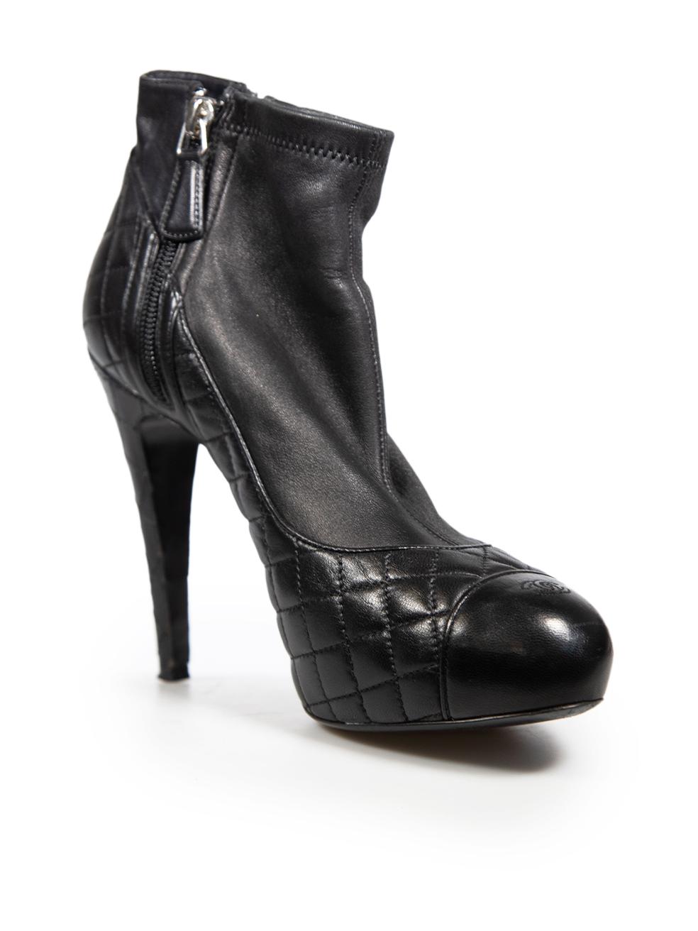 CONDITION is Very good. Minimal wear to the boots is evident, there are abrasions on the heels. The left boot has a mild abrasion on the front tip and the left boot has a small scratch on the front of the toe box. The insole brand label is slightly