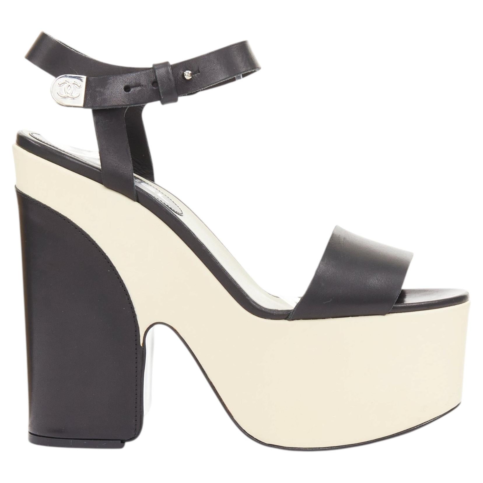 CHANEL 2012 black cream bicolor calfskin silver CC wedge platform heels EU37.5 For Sale