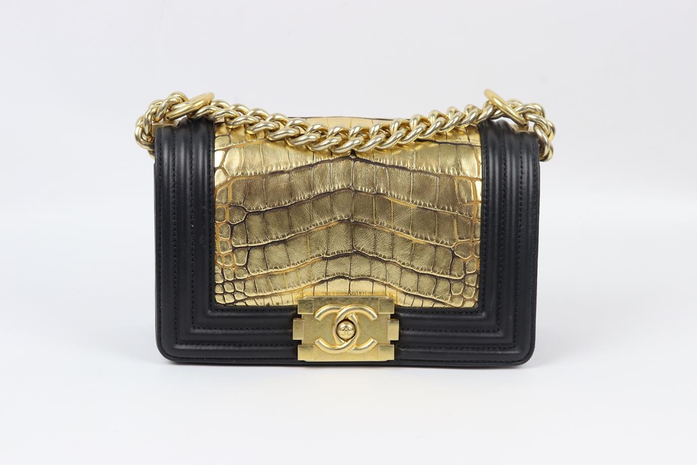 <ul>
<li>Chanel 2012 Boy small alligator and leather shoulder bag.</li>
<li>Made from gold and black alligator and black leather with matching leather interior and antiqued-gold chain shoulder straps.</li>
<li>Black and gold.</li>
<li>Push lock